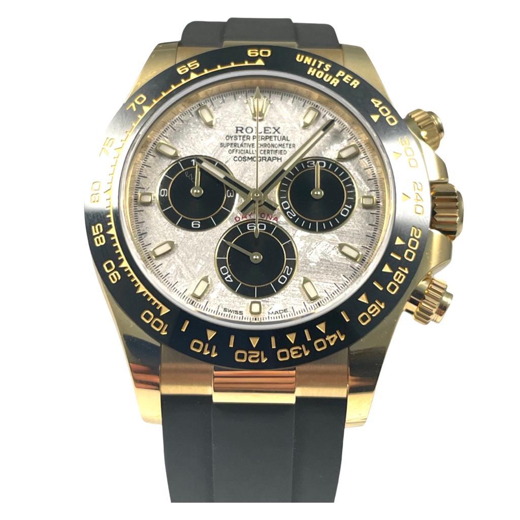 Brand: Rolex

Model Name: Daytona

Model Number: 116518LN

Movement: Automatic

Case Size: 40 mm

Case Back: Closed

Case Material: 18k Yellow Gold

Bezel: Ceramic

Dial: Meteorite 

Bracelet:  Oysterflex Rubber

Hour Markers: Non