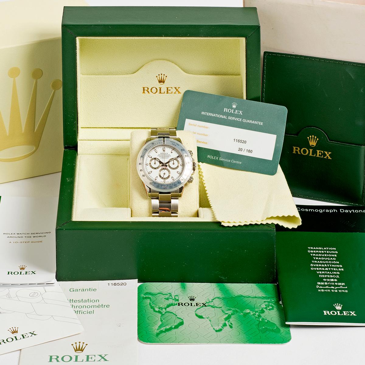 Our Rolex Daytona reference 116520 features a white dial and stainless steel case and Oyster bracelet. Benefitting from a complete service at Rolex Service Centre in 2020, our Daytona retains the remainder of the 2 year manufacturers warranty and