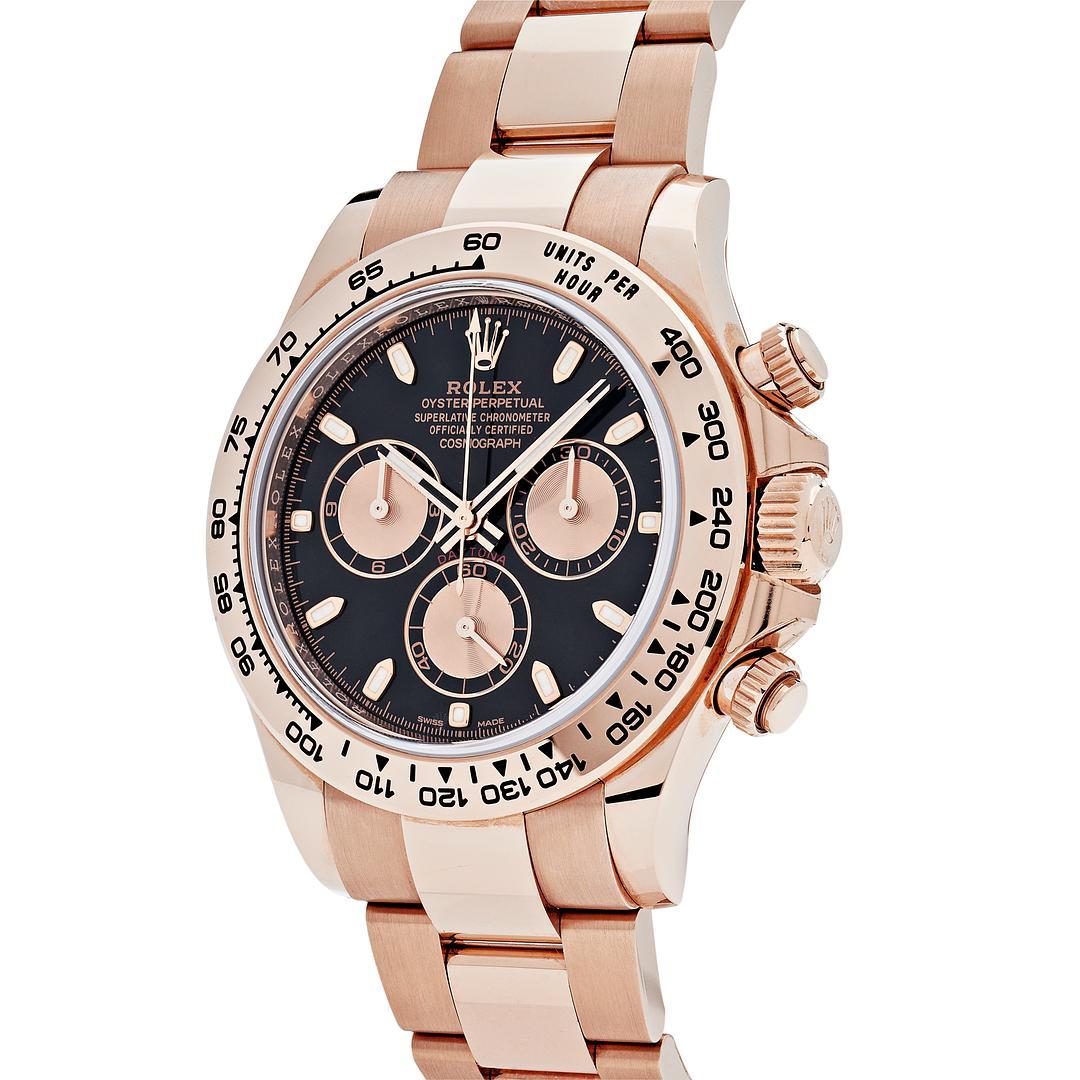 The Rolex Daytona is designed with a high-performance chronograph, measuring an average speed of up to 400 kilometers per hour. This Daytona features a 40mm 18ct rose gold case and rose gold bezel with an engraved tachymetric scale. It surrounds a