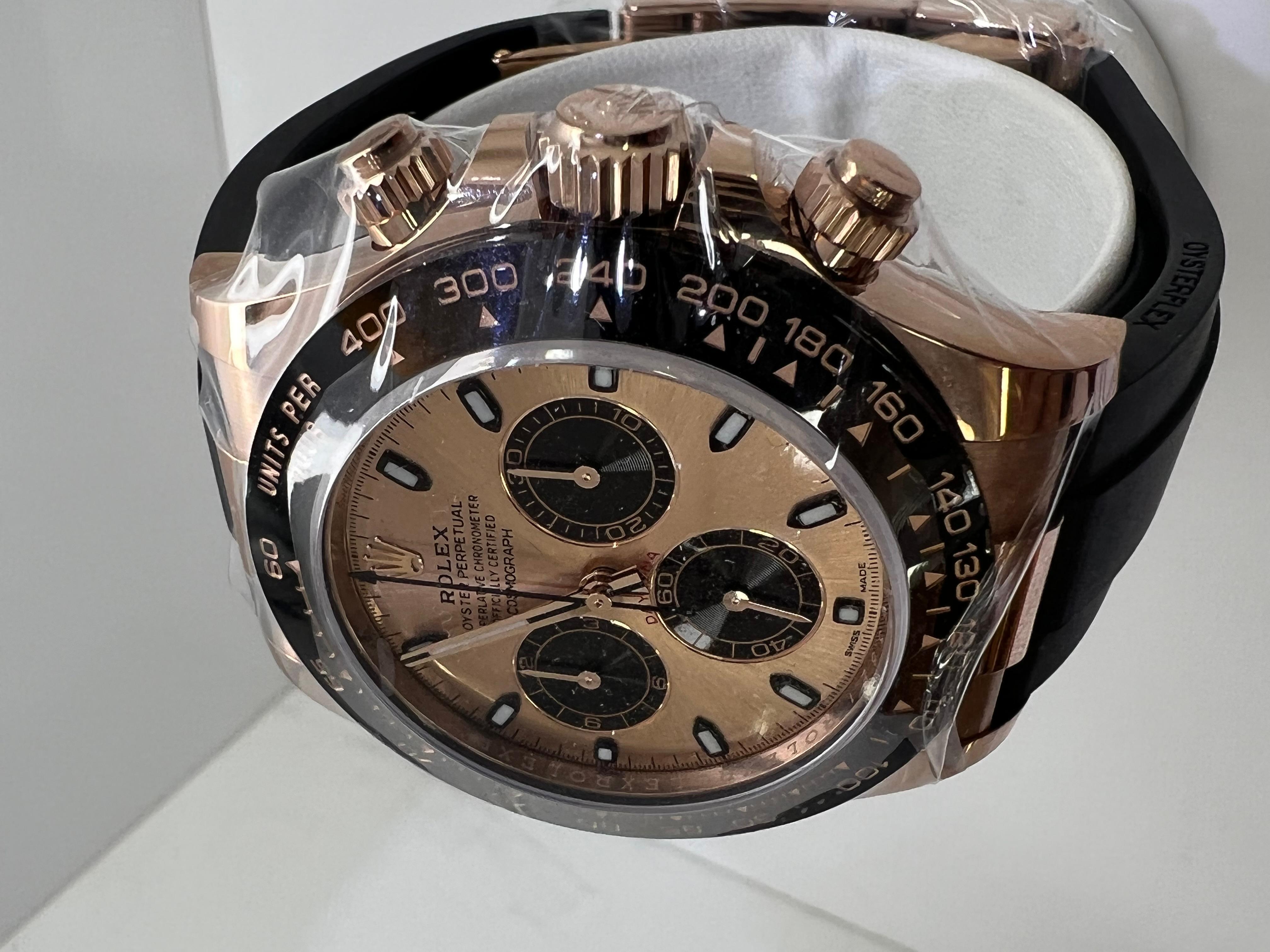 Rolex Daytona Rose Gold Sundust Dial Brand New Men's Watch 

excellent condition

This watch is 100% all original Rolex

Original Rolex Box & Papers 

Shop With Confidence 

5 Year Warranty

