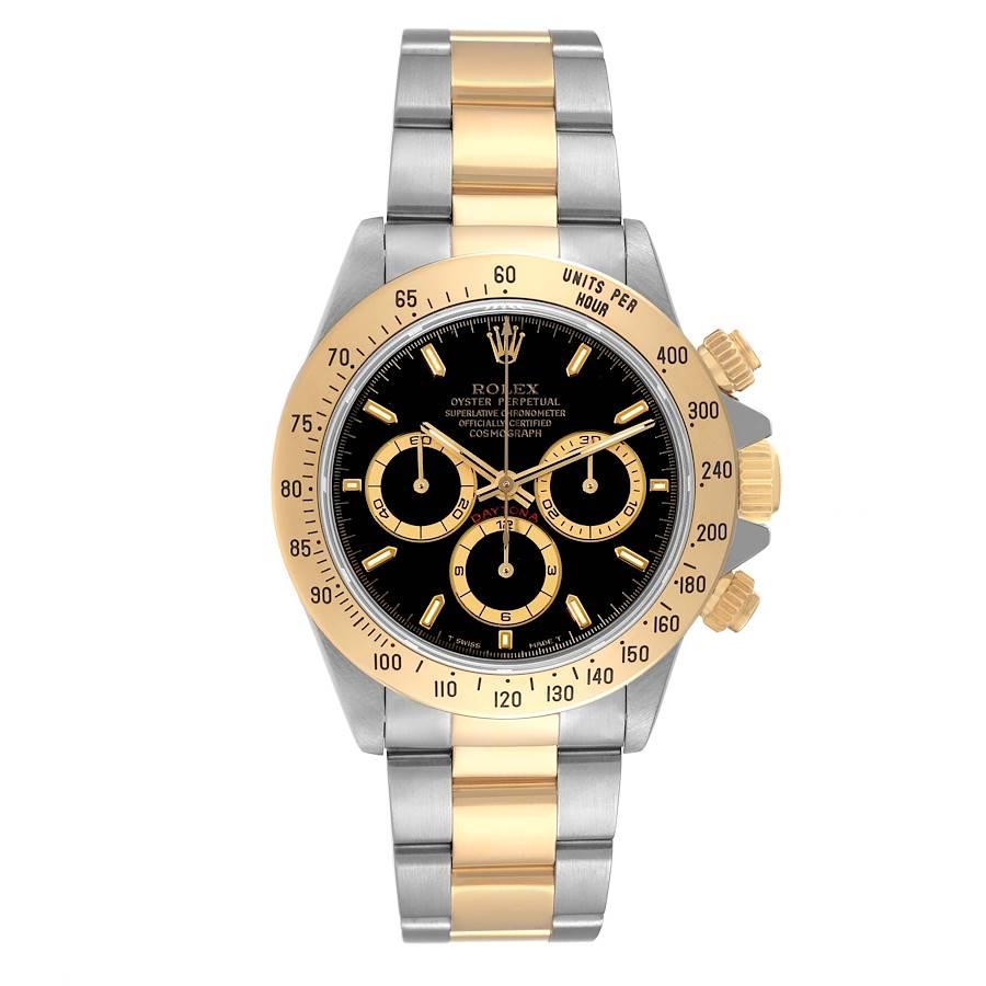 Rolex Daytona Steel Yellow Gold Black Dial Mens Watch 16523. Officially certified chronometer self-winding movement. Rhodium-plated, oeil-de-perdrix decoration, straight line lever escapement, monometallic balance adjusted to 5 positions, shock