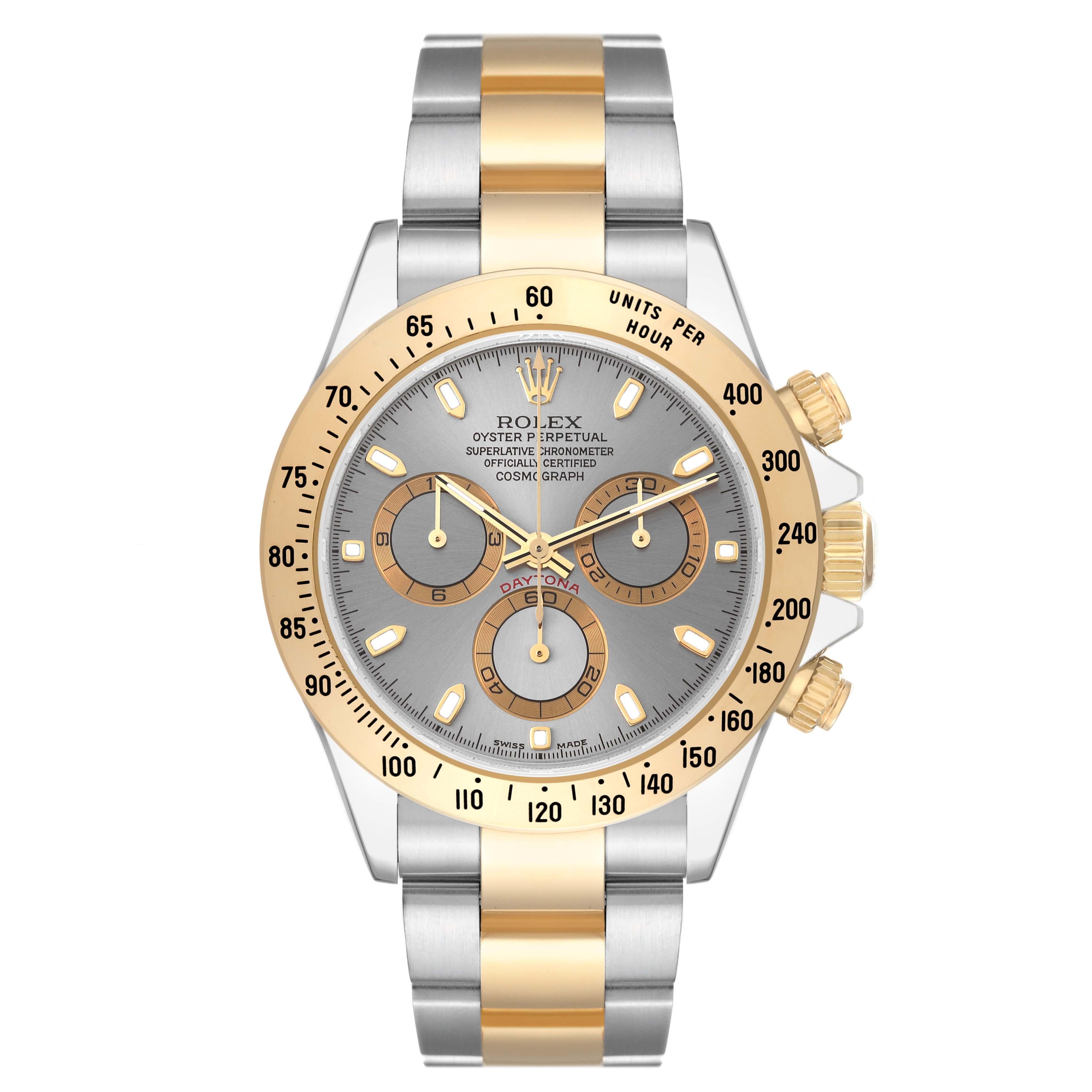Rolex Daytona Steel Yellow Gold Slate Dial Mens Watch 116523 Box Papers. Officially certified chronometer self-winding movement. Rhodium-plated, oeil-de-perdrix decoration, straight line lever escapement, monometallic balance adjusted to 5
