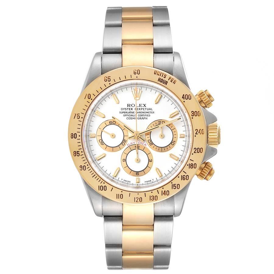 Rolex Daytona Steel Yellow Gold White Dial Mens Watch 16523. Officially certified chronometer self-winding movement. Stainless steel and 18K yellow gold case 40.0 mm in diameter. Special screw-down push buttons. Triplock winding crown protected by