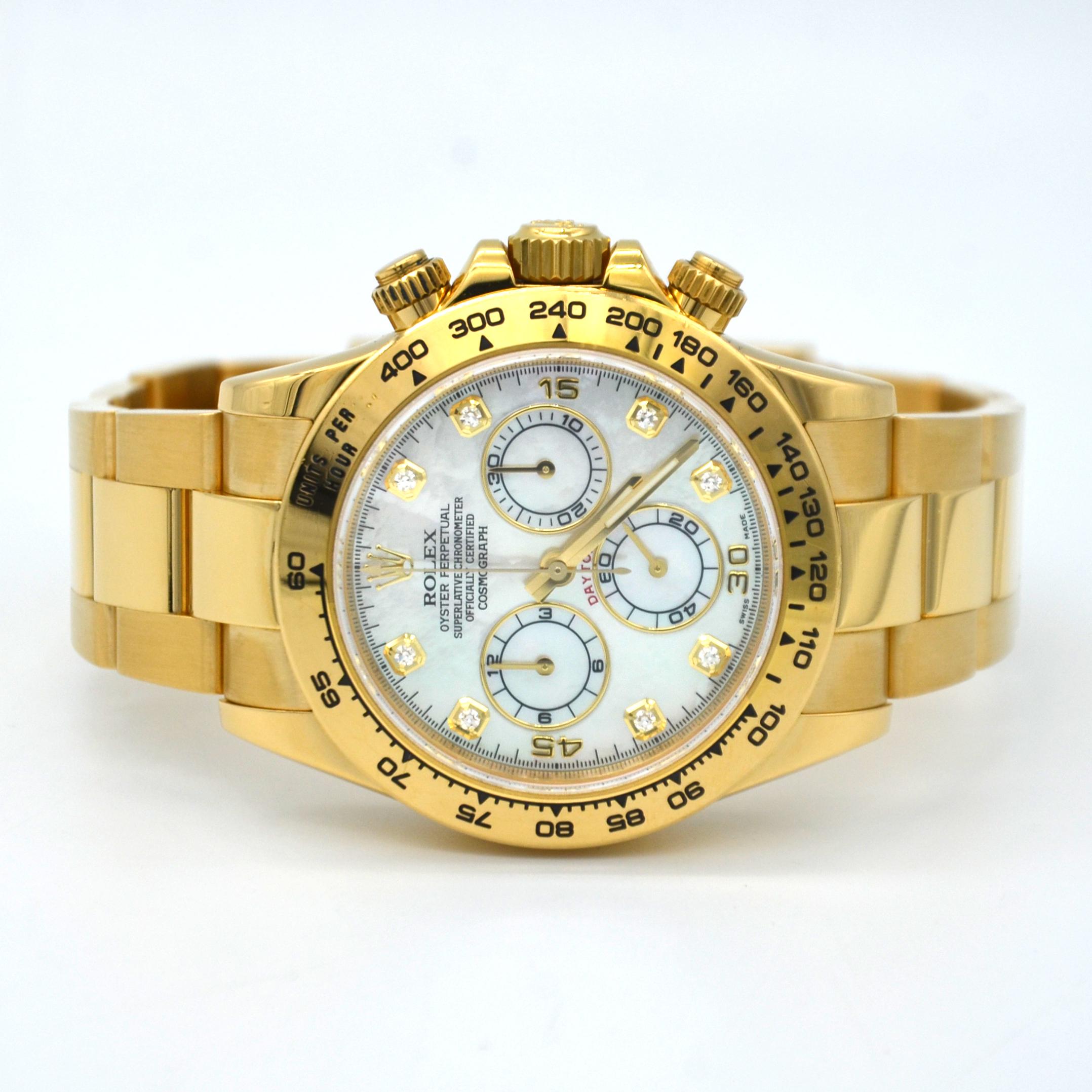 18k yellow gold case with a 18k yellow gold rolex oyster bracelet. Fixed 18k yellow gold tachymeter bezel. White Mother of Pearl Diamond dial with gold-tone hands and index hour markers. Minute markers around the outer rim. Dial Type: Analog.