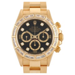 Montre Rolex Daytona en or jaune sertie de diamants 16568