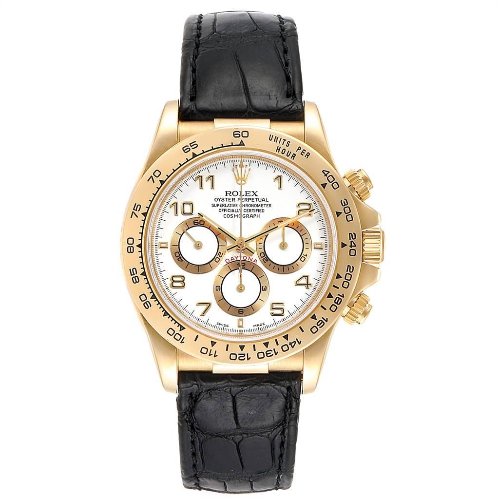 Rolex Daytona Yellow Gold White Dial Black Strap Mens Watch 16518. Officially certified chronometer automatic self-winding movement. Chronograph function. 18K yellow gold case 40.0 mm in diameter.  Special screw-down push buttons. 18K yellow gold