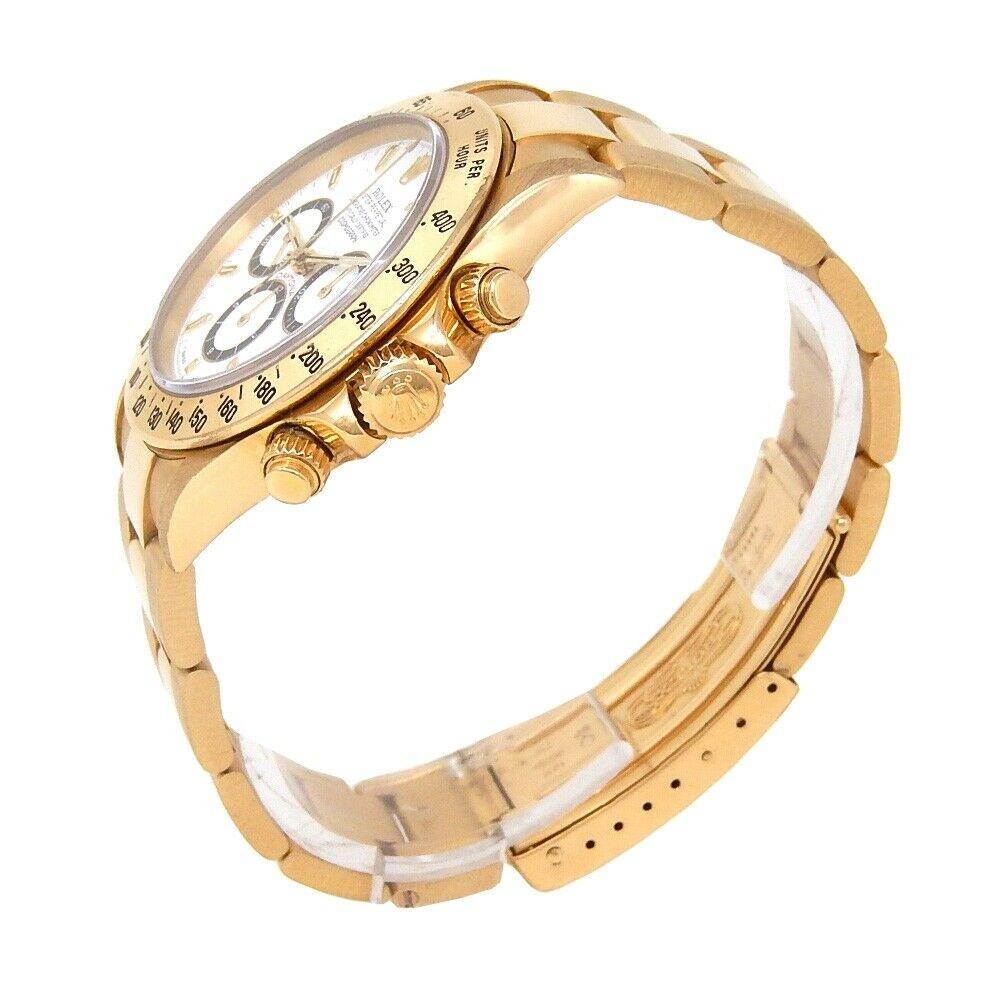 Brand: Rolex
Band Color: Yellow Gold	
Gender:	Men's
Case Size: 40-43.5mm	
MPN: Does Not Apply
Lug Width: 20mm	
Features:	12-Hour Dial, Chronograph, Gold Bezel, Sapphire Crystal, Swiss Made, Swiss Movement
Style: Luxury	
Movement: Mechanical