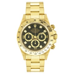 Rolex Daytona Zenith Yellow Gold Black Diamond Dial NOS 16528