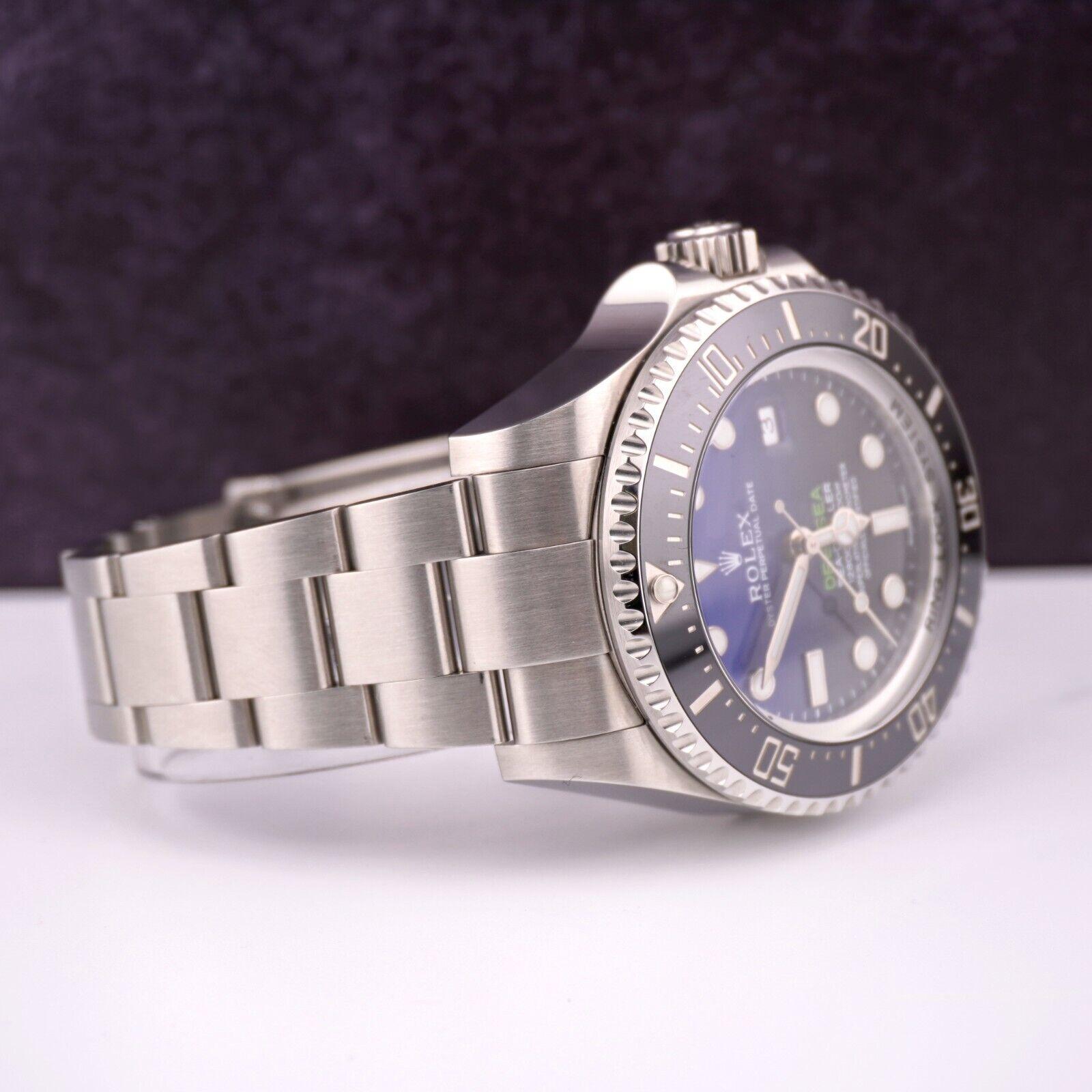 Rolex Deep Sea-Dweller Date 44mm Watch

Pre-owned w/ Original Box & Card
100% Authentic Authenticity Card
Condition - (Excellent Condition) - See Pics
Watch Reference - 116660
Model - Deep Sea-Dweller
Dial Color - Blue, Black
Material - Stainlees