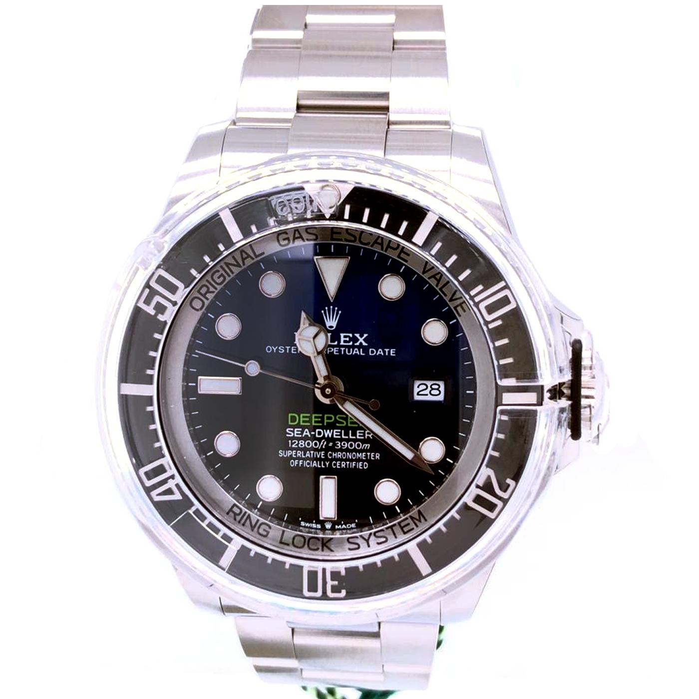 The Oyster Perpetual Rolex Deepsea in Oystersteel with a Cerachrom bezel insert in black ceramic and an Oyster bracelet. It features a D-blue dial and large luminescent hour markers. Waterproof to a depth of 3,900 meters (12,800 feet) with a