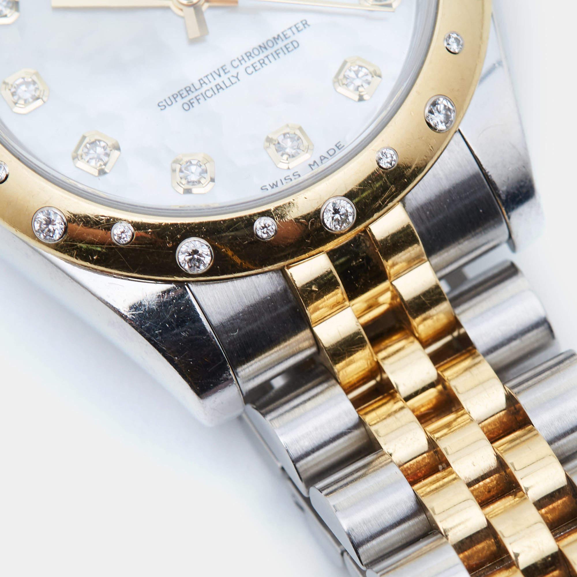 This beautiful Rolex Datejust for women will be a fine investment. Crafted using stainless steel and 18k yellow gold, the automatic watch features a mother-of-pearl dial set with diamond hour markers, a date window, and three hands. More diamonds