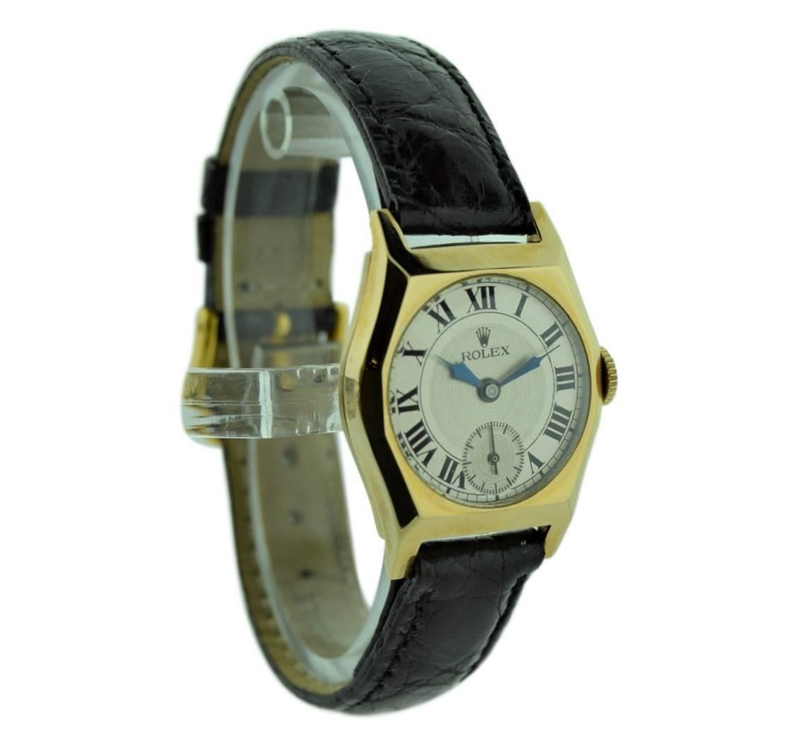 FACTORY / HOUSE: Rolex Watch Company
STYLE / REFERENCE: Dress Style / 
METAL / MATERIAL: 9kt. Solid Gold 
CIRCA: 1920's
DIMENSIONS: 35mm X 27mm
MOVEMENT / CALIBER: Winding / 15 Jewels 
DIAL / HANDS:
ATTACHMENT / LENGTH:  Alligator, mm / Regular