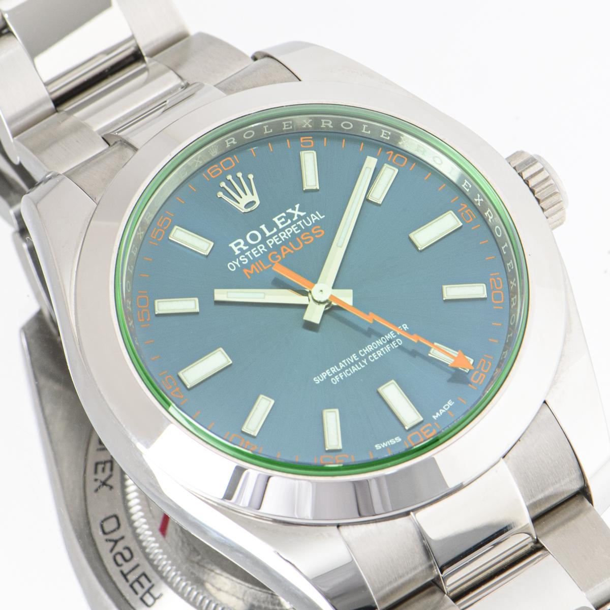 A 40mm Milgauss from Rolex in Oystersteel, featuring an electric Z-Blue dial concealed with green scratch-resistant sapphire crystal. The orange second's hand, shaped like a lightning bolt echo's the original model.

Features an Oyster bracelet