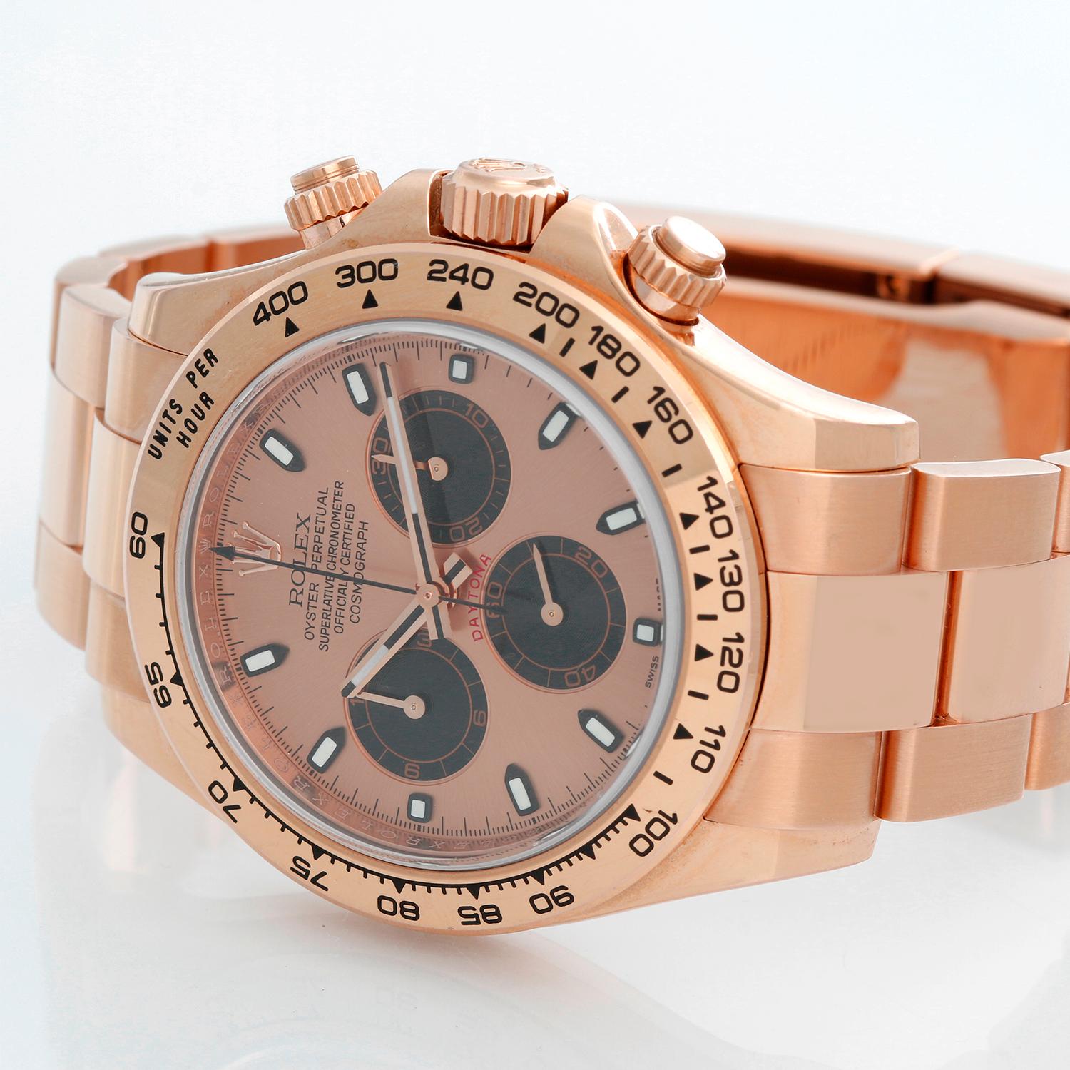 Rolex Everose Cosmograph Daytona Men's Rose Gold Watch Black Subdials 116505 - Automatic winding, 44 jewel chronometer, chronograph. 18k rose gold case with tachymeter engraved bezel (40mm diameter). Rose gold dial with raised baton hour markers and