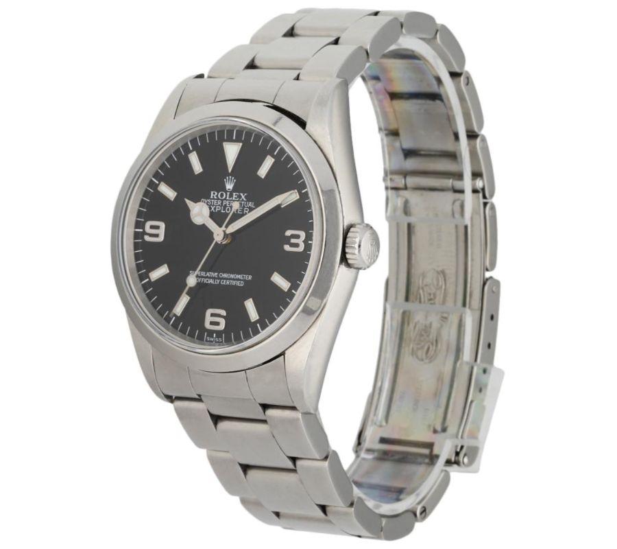 Rolex Explorer 14270 Men's Watch. 36mm Stainless Steel case. Stainless Steel fixt bezel. Black dial with luminous steel hands and index & Arabic numeral hour marker. Minute markers on the outer dial. Stainless Steel oyster bracelet with Fold Over