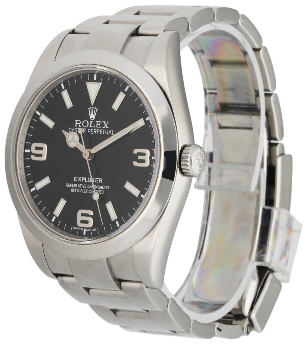 Rolex Explorer 214270 Men's Watch. 39mm Stainless Steel case. Stainless Steel smooth bezel. Black dial with Luminous Steel hands and index & Arabic numeral hour markers. Minute markers on the outer dial. Engraved rehaut. Stainless Steel Bracelet