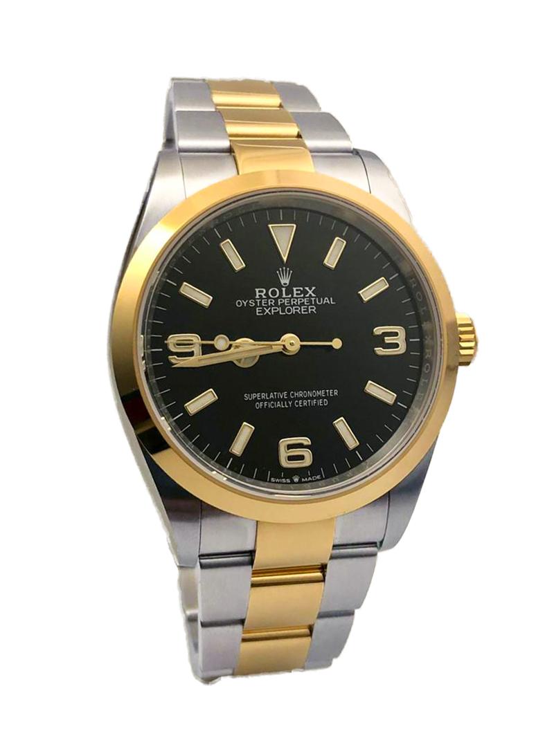 Brand: Rolex

Model: Explorer

Year: 2022

Reference No.: 124273

Movement:  Automatic Winding

Case Material: Stainless Steel

Case Size: 36 mm

Case Shape: Round

Dial: Black with stick and 3,6 and 9

Bezel: 18k yellow gold

Bracelet: Stainless