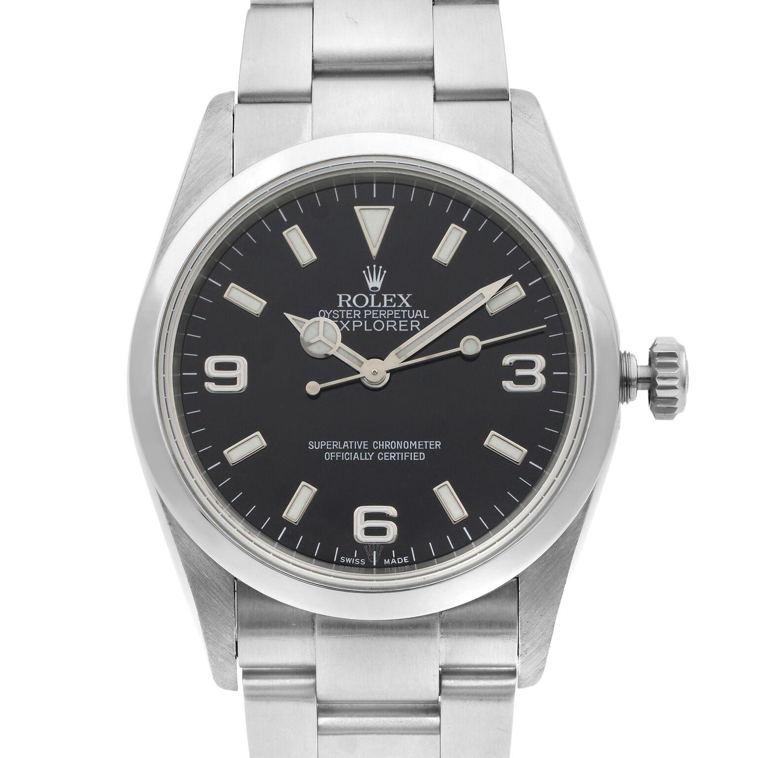 This pre-owned Rolex Explorer 114270 is a beautiful men's timepiece that is powered by a mechanical (automatic) movement which is cased in a stainless steel case. It has a round shape face, no features dial, and has hand sticks & numerals style