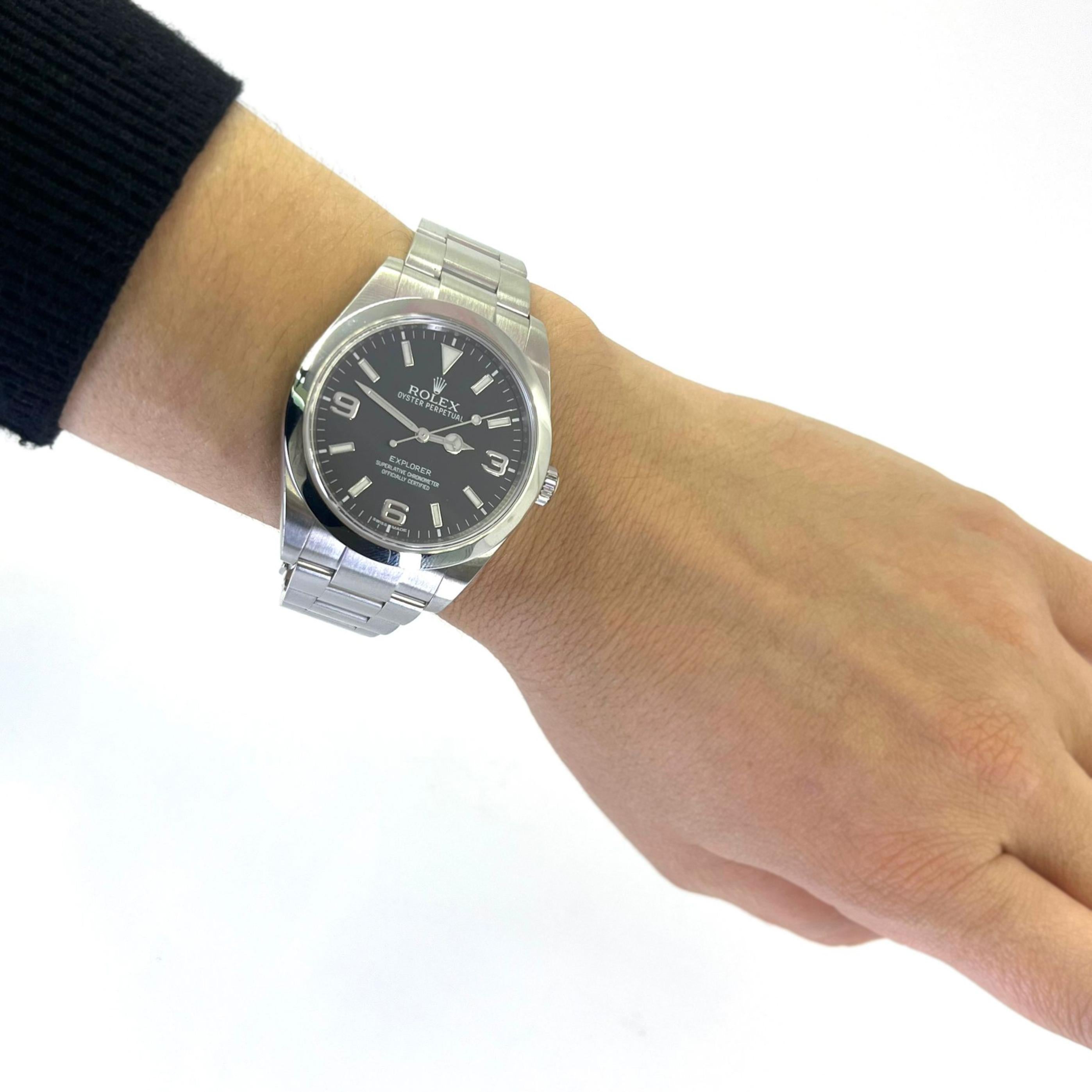 Pre-Owned 39mm Rolex Explorer Automatic Watch Crafted in Stainless Steel with a Black Dial. Model 214270 with Box, Hang Tag, Booklet and 2016 Card. Polished and Serviced April 2024.