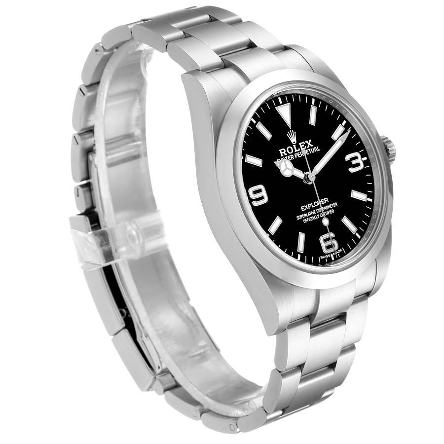 Rolex Explorer I Luminescent Arabic Numerals Mens Watch 214270 Box Card. Officially certified chronometer self-winding movement. Stainless steel case 39 mm in diameter. Rolex logo on a crown. Stainless steel smooth bezel. Scratch resistant sapphire