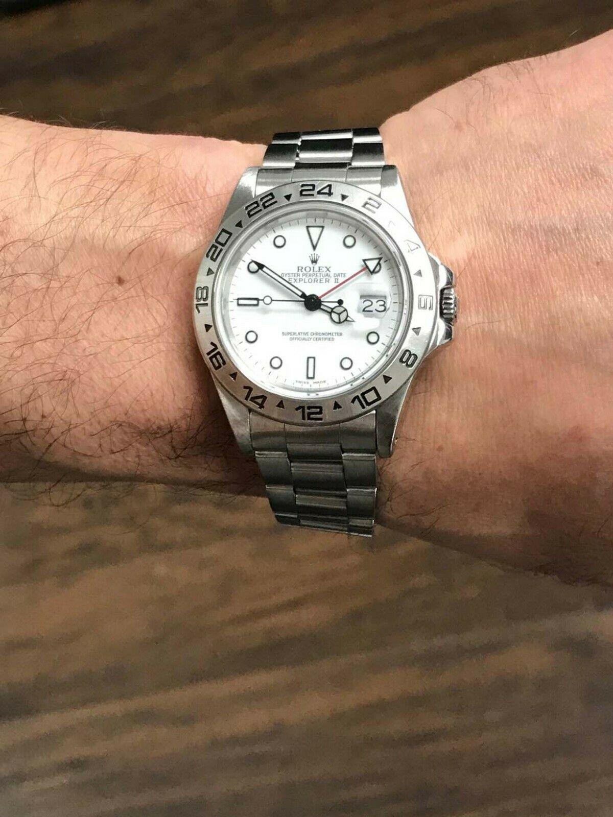 Style Number: 16550
 
Serial: 9100***
 
Model: Explorer II
 
Case Material: Stainless Steel
 
Band: Stainless Steel
 
Bezel: Stainless Steel
 
Dial: White
 
Face: Sapphire Crystal 
 
Case Size: 40mm
 
Includes: 
-Rolex Box & Service