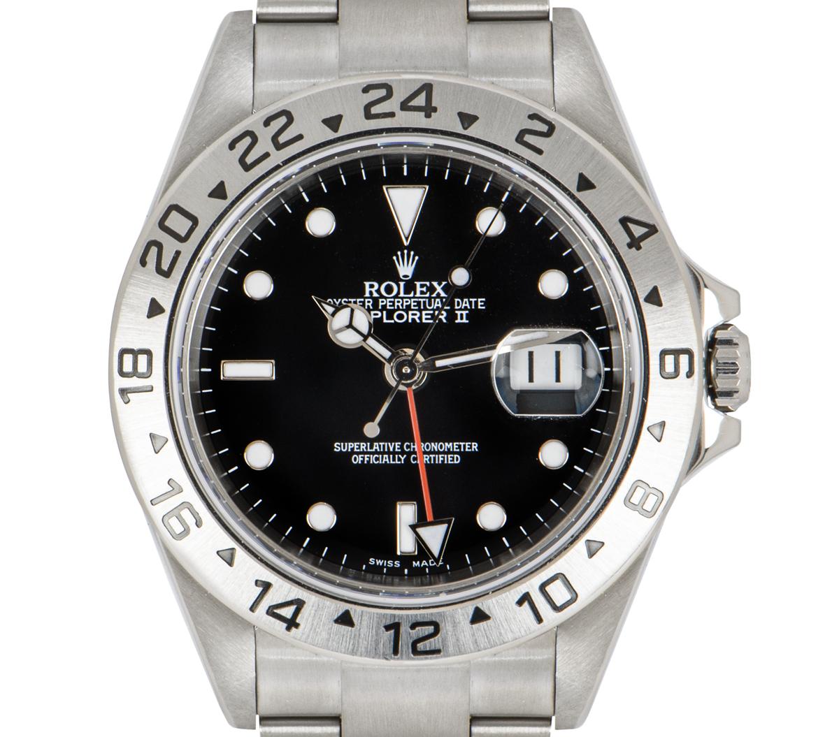 A stainless steel Explorer II by Rolex. Featuring a black dial with a date aperture and a red 24 hour hand. Complementing the dial is a stainless steel fixed bezel with a 24 hour display. Equipped with an Oyster bracelet and an Oysterlock deployant