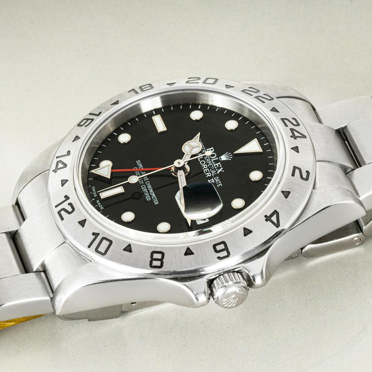 A 40mm Explorer II by Rolex in stainless steel. Features a black dial with a date aperture and a red 24-hour hand, complemented by fixed a stainless steel fixed with a 24-hour display. Fitted with a sapphire glass, a self-winding automatic movement,