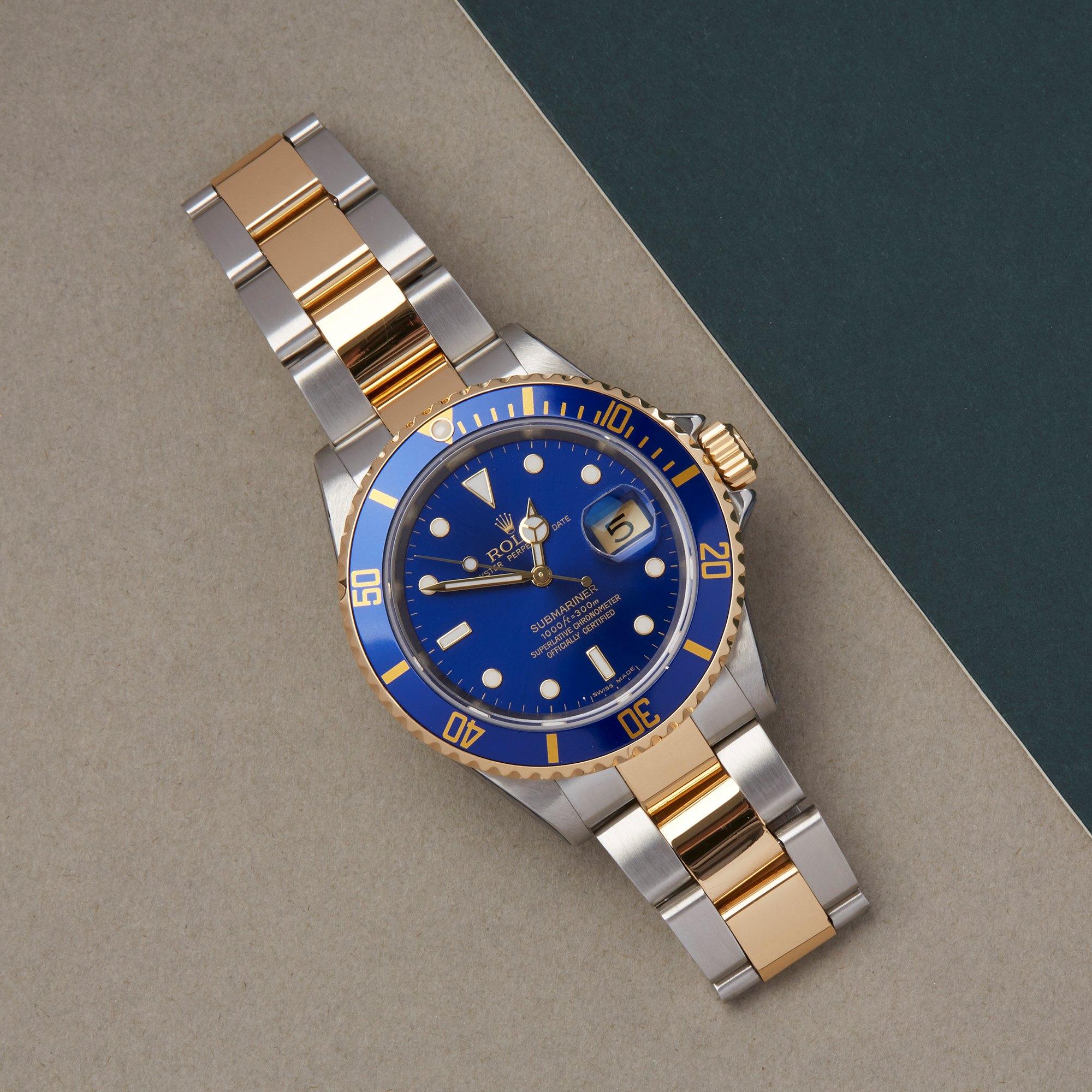Xupes Reference: W007646
Manufacturer: Rolex
Model: Submariner
Model Variant: Date
Model Number: 16613
Age: 2006
Gender: Men
Complete With: Rolex Box, Manuals, Guarantee, Card Holder & Swing Tag
Dial: Blue Other
Glass: Sapphire Crystal
Case Size: