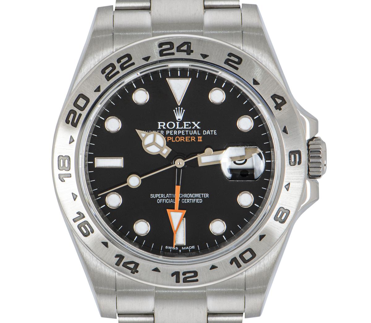 A men's Explorer II wristwatch in Oyster steel by Rolex. Featuring a black dial with applied hour markers, a date aperture, and an orange 24 hour hand. Complimenting the dial is a fixed stainless steel bezel with an engraved 24 hour display.

Fitted