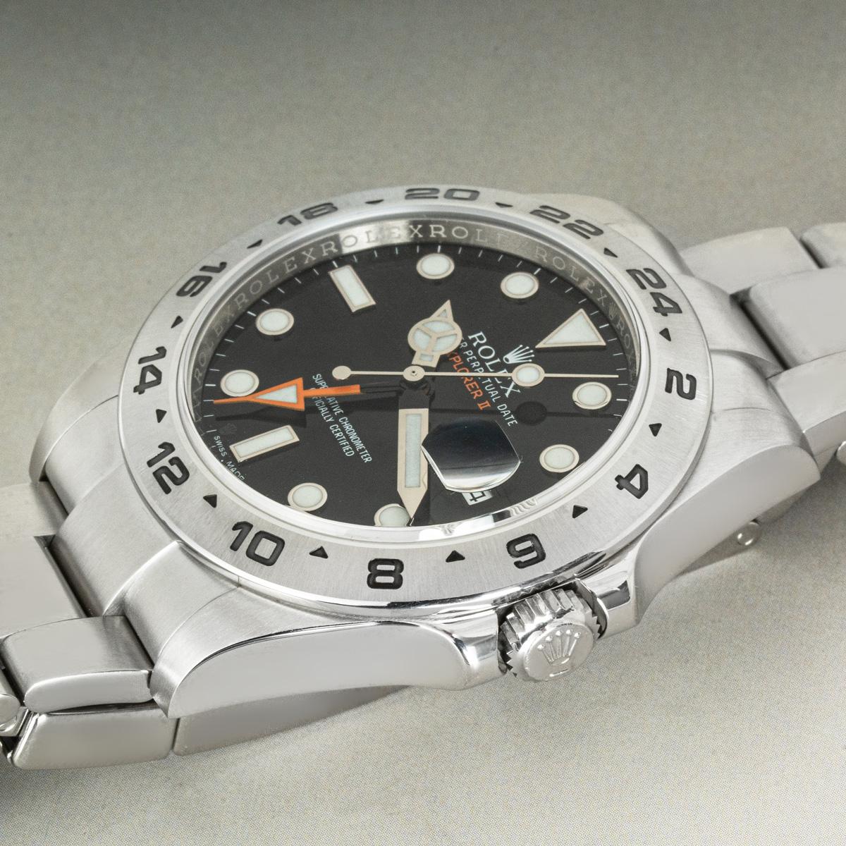 A 42mm Explorer II in Oystersteel by Rolex. Featuring a black dial with applied hour markers, a date display, an orange 24-hour hand and a fixed steel bezel with an engraved 24-hour display.

Fitted with sapphire crystal and a self-winding automatic