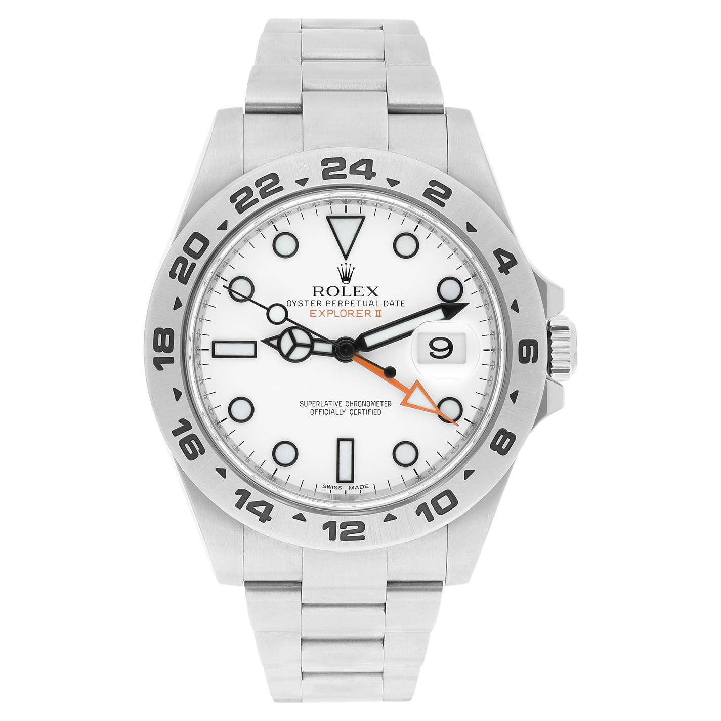Silver-tone stainless steel case with a silver-tone stainless steel oyster bracelet. Fixed silver-tone stainless steel bezel. White dial with luminous black hands and index hour markers. Minute markers around the outer rim. Luminescent hands and