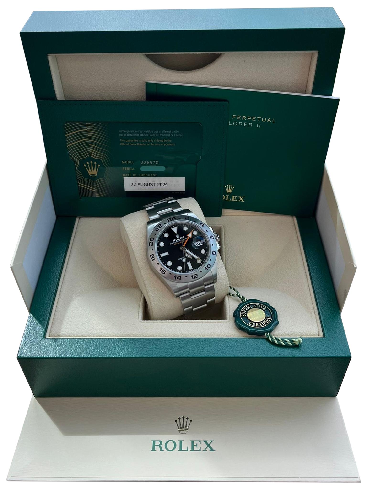 This Oyster Perpetual Explorer II in Oystersteel with an Oyster bracelet features a black dial with an arrow-shaped 24-hour hand and hour markers with a Chromalight display. The Explorer II is equipped with an additional 24-hour display; a dedicated