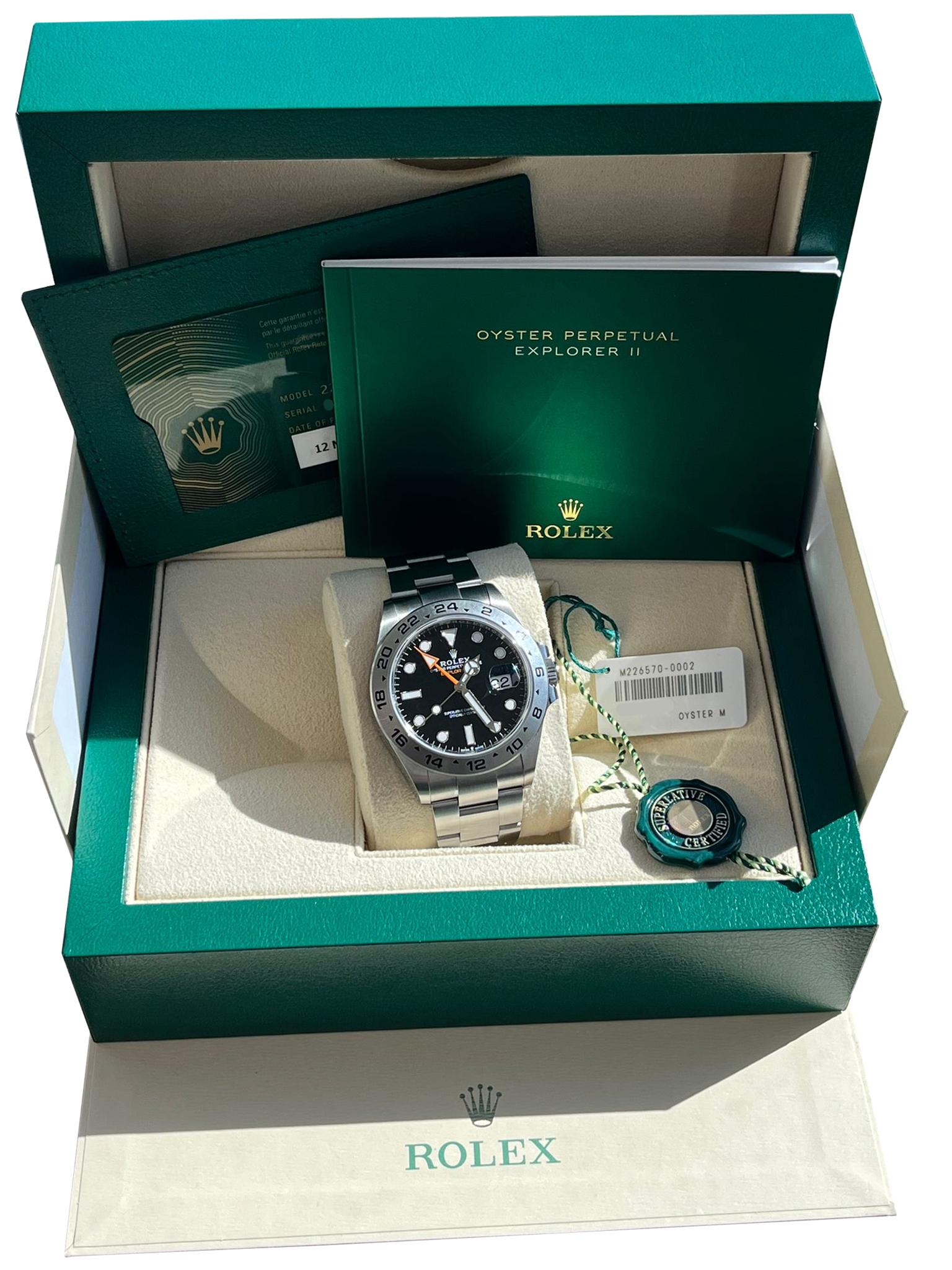This Oyster Perpetual Explorer II in Oystersteel with an Oyster bracelet features a black dial with an arrow-shaped 24-hour hand and hour markers with a Chromalight display. The Explorer II is equipped with an additional 24-hour display; a dedicated