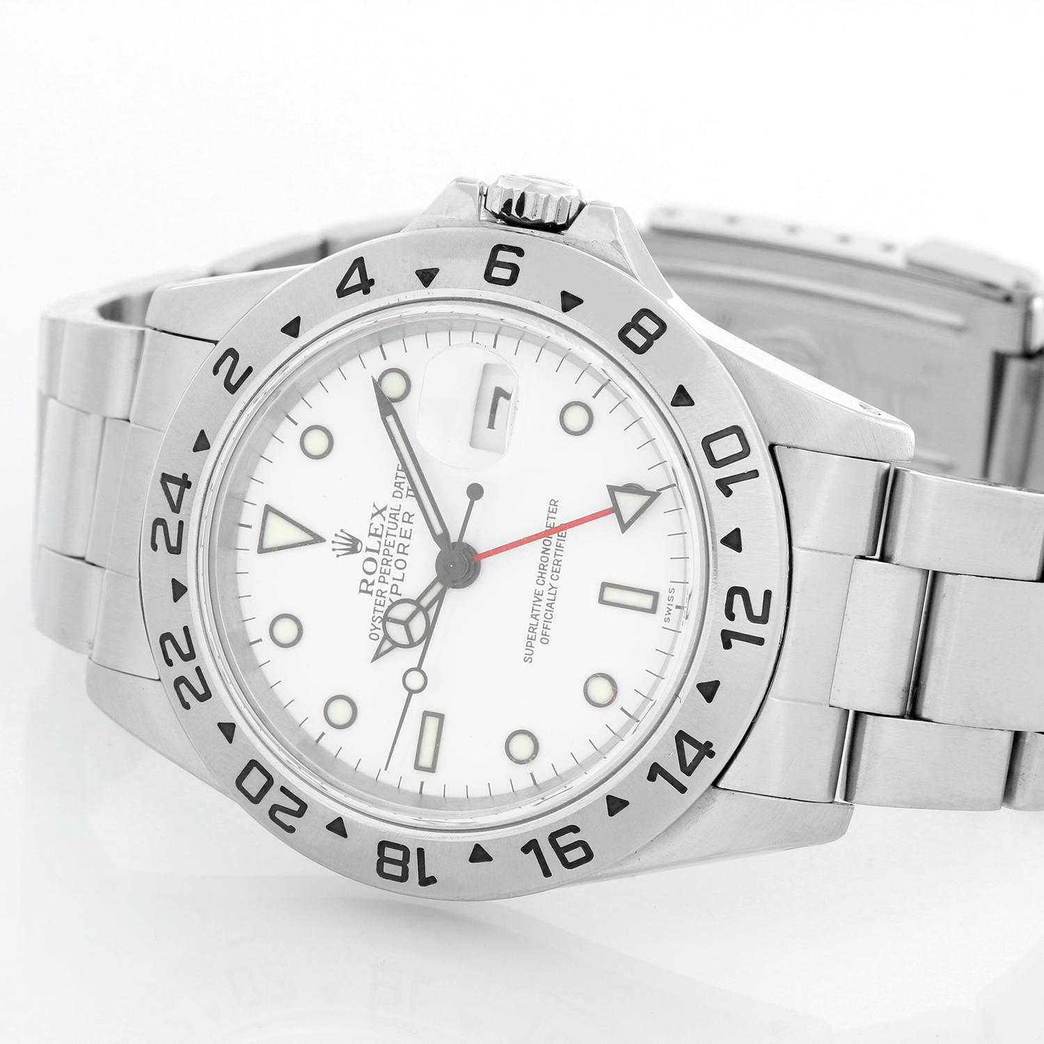 Rolex Explorer II  Men's Stainless Steel Watch 16570 - Automatic winding, 31 jewels, Quickset, sapphire crystal, dual time. Stainless steel case (42mm diameter). White dial with luminous markers. Stainless steel Oyster bracelet with folding buckle.