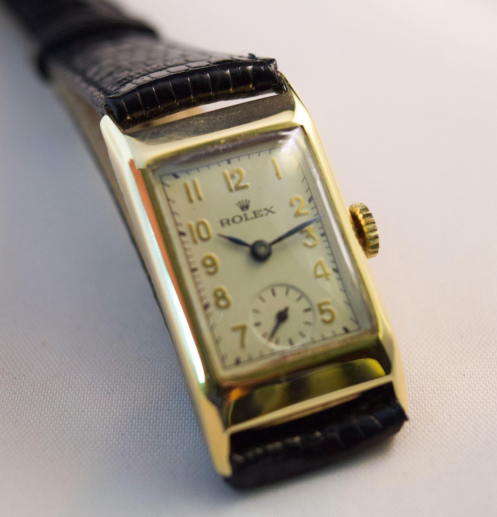 Rolex Ref 2356 Circa 1930
Rolex Vintage Rectangular solid gold case with solid wire gold fixed lugs.
This attractive watch is manual hand winding.
Excellent condition it has been recently serviced-cleaned-restored from top to bottom by competent