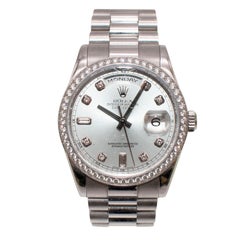 Rolex Montre President Day-Date en platine avec cadran en diamant bleu glacier et cadran en platine