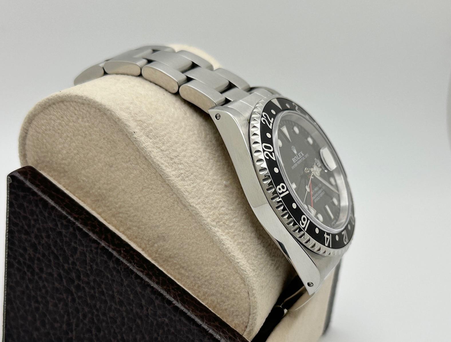 Uomo Rolex GMT Master 16700 40mm Nero Acciaio Inox Scatola Carta di Servizio in vendita