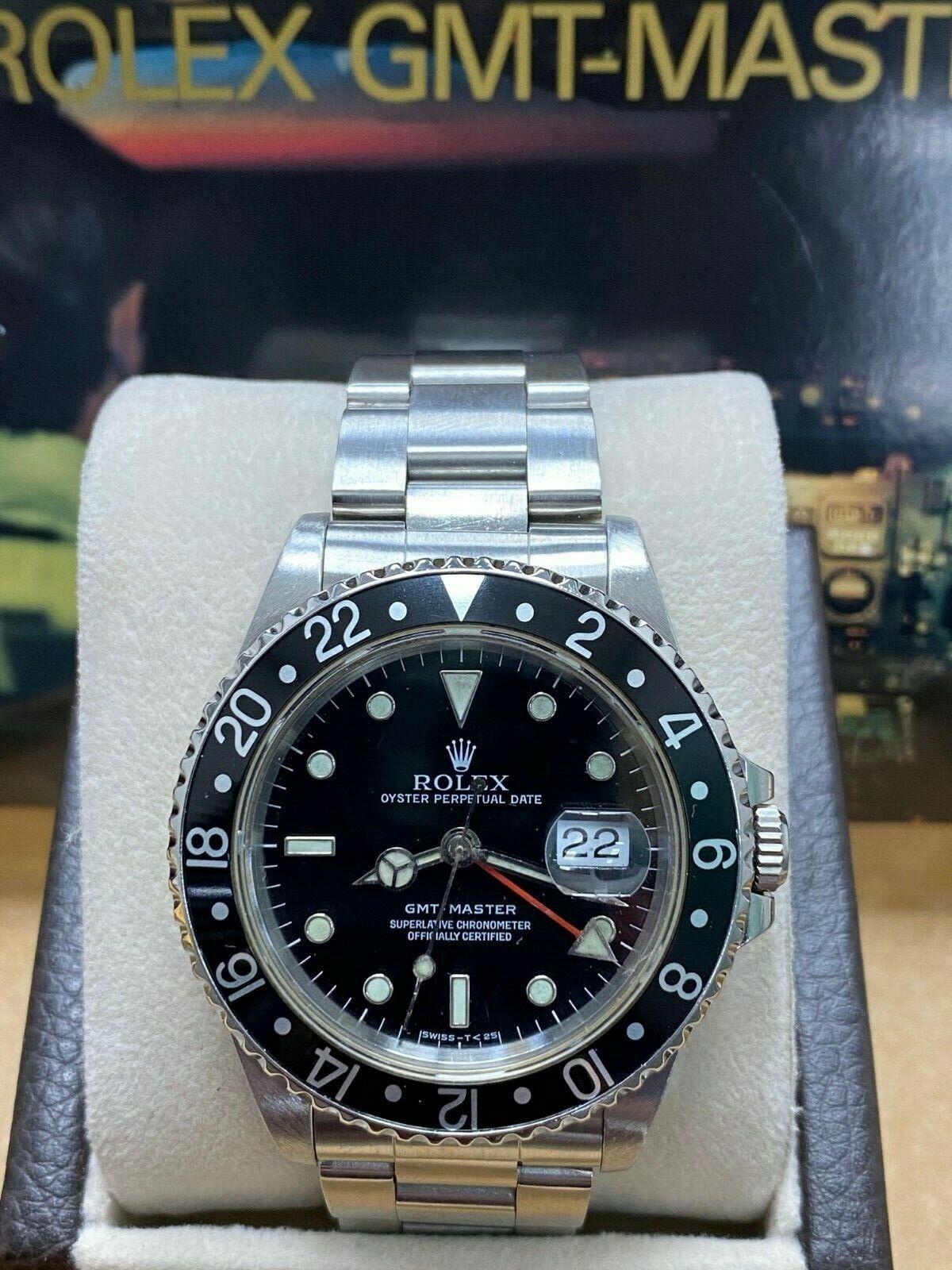 Style Number: 16700

 

Serial: E634***



Model: GMT Master 

 

Case Material: Stainless Steel

 

Band: Stainless Steel

 

Bezel: Black

 

Dial: Black

 

Face: Sapphire Crystal

 

Case Size: 40mm

 

Includes: 

-Rolex Box &