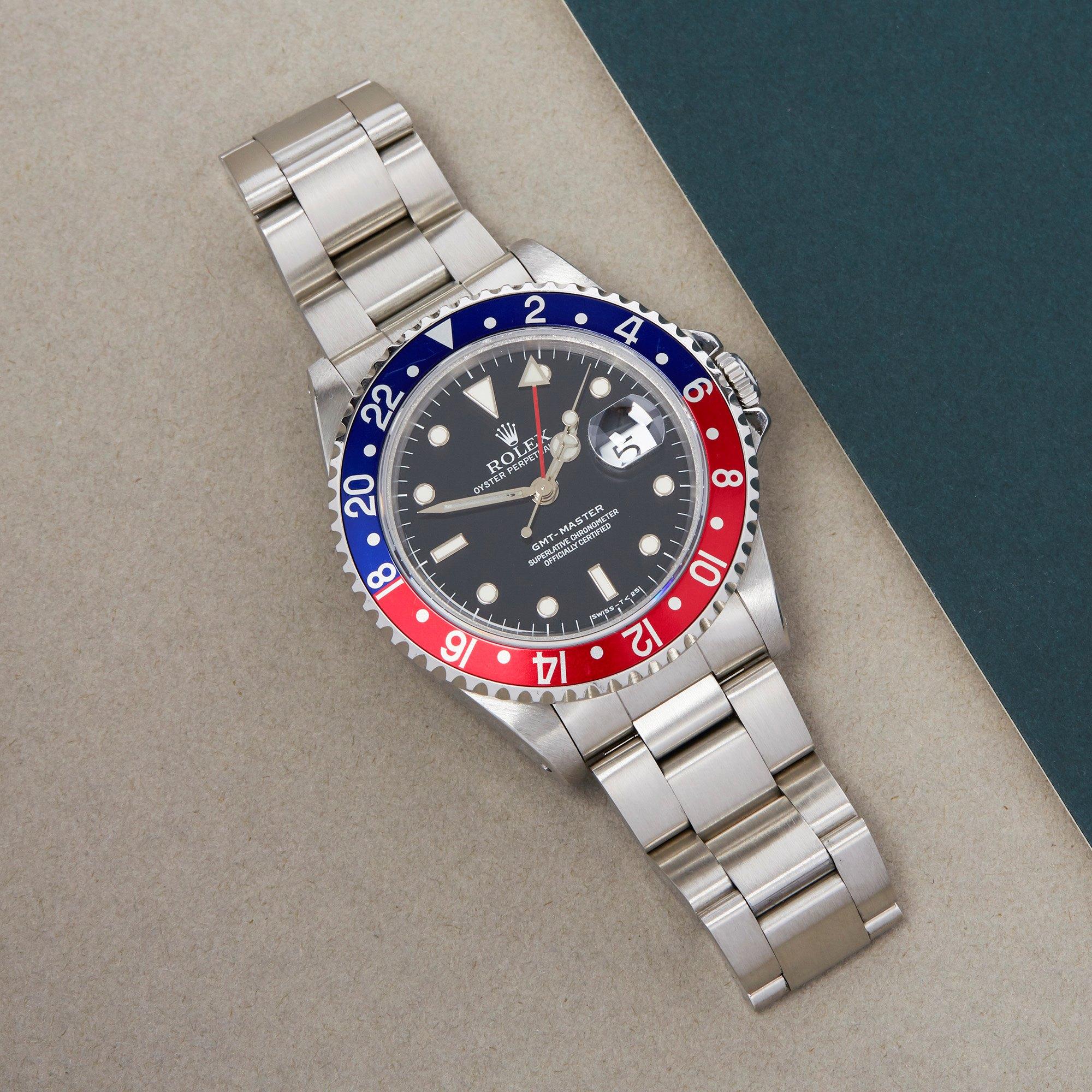 Xupes Reference: W007682
Manufacturer: Rolex
Model: GMT-Master
Model Variant: 0
Model Number: 16700
Age: 35126
Gender: Men
Complete With: Rolex Box, Manuals, Guarantee, Card Holder, Service Pouch  & Swing Tag
Dial: Black Other
Glass: Sapphire