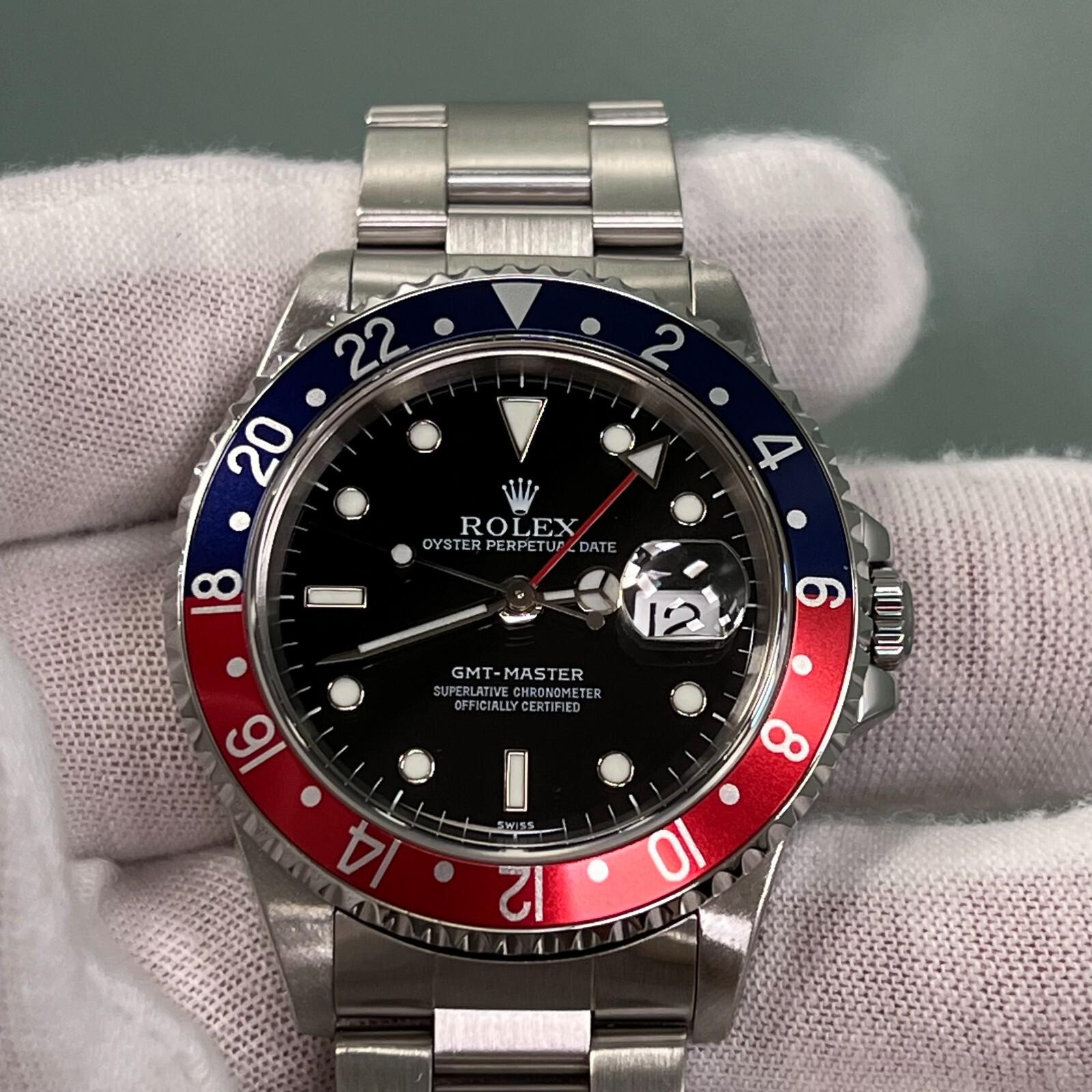 Style Number: 16700



Serial: A489***



Year: 1999

 

Model: Rolex GMT Master 

 

Case Material: Stainless Steel 

 

Band: Stainless Steel 

  

Bezel: Pepsi - Red and Blue 

  

Dial: Black Dial 

 

Face: Sapphire Crystal 

 

Case Size: 40mm