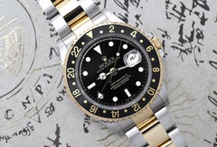Rolex GMT-Master 16713 Stainless Steel and Yellow Gold Watch with Black Dial