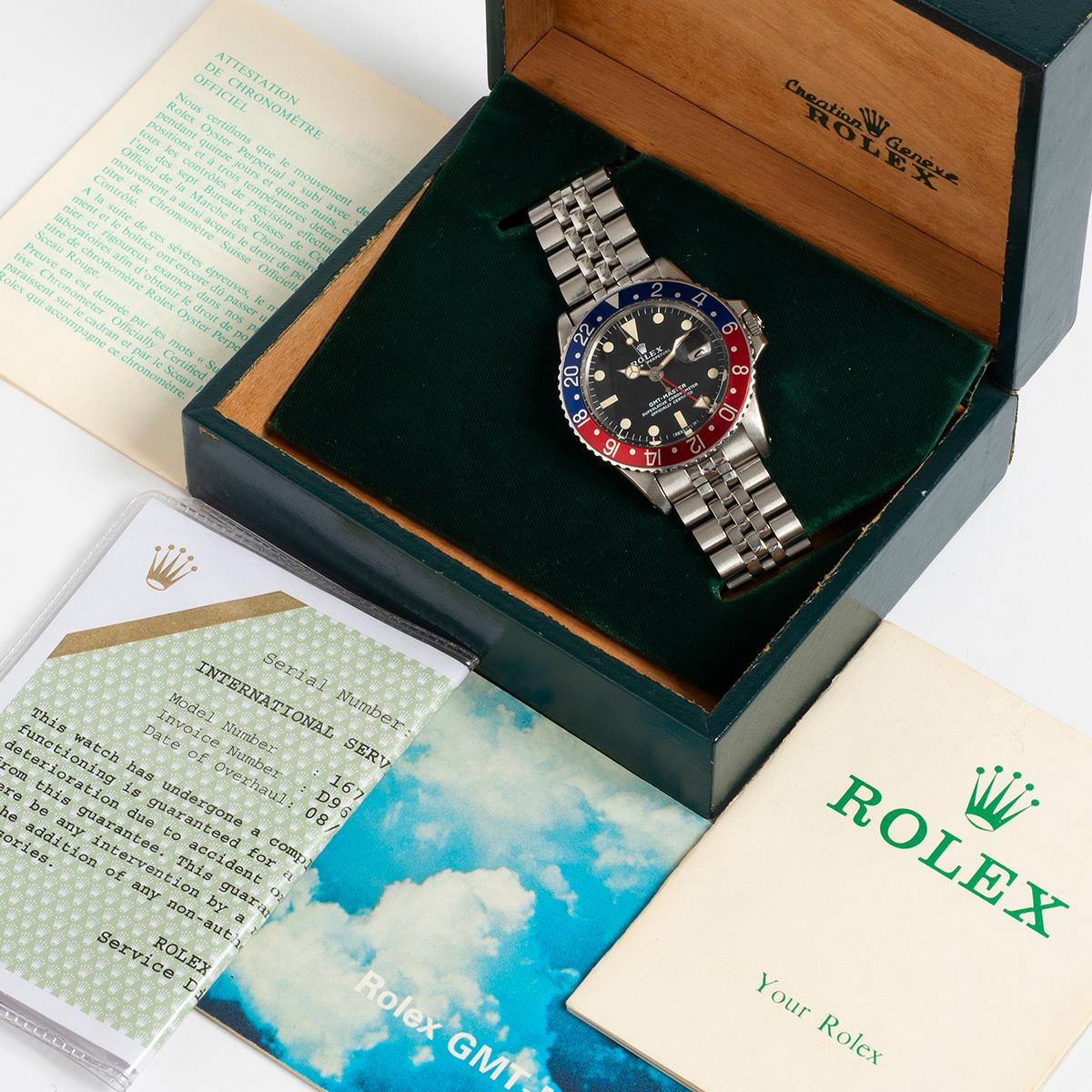 Our rare vintage Rolex GMT Master, reference 1675 , is presented in excellent condition for its age. Featuring a classic combination of pepsi blue and red bezel, stainless steel case and stainless steel jubilee bracelet. The original matching hands