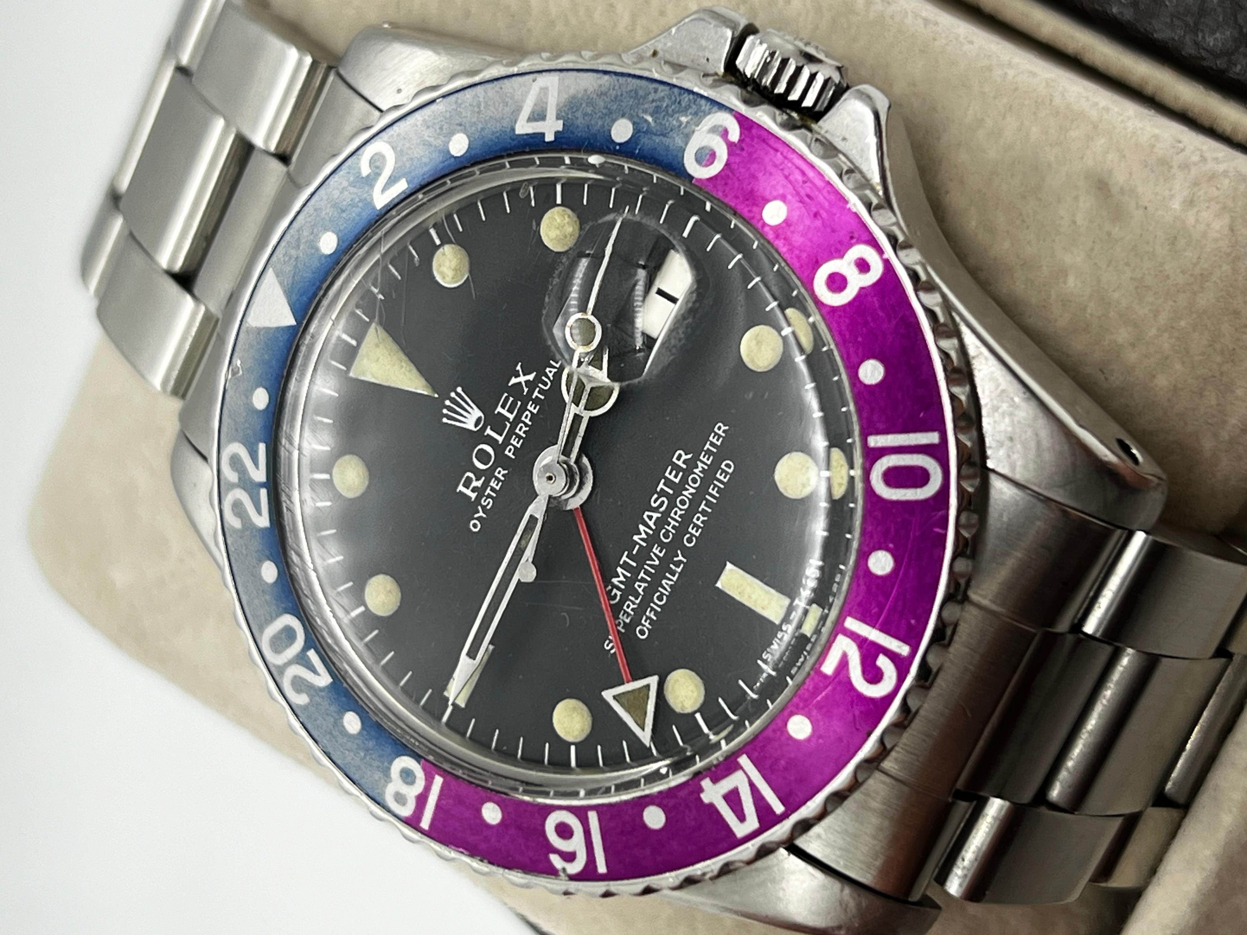 Rolex GMT MASTER 1675 Pepsi fuchsia lunette longue E en acier inoxydable 1968 Bon état à San Diego, CA