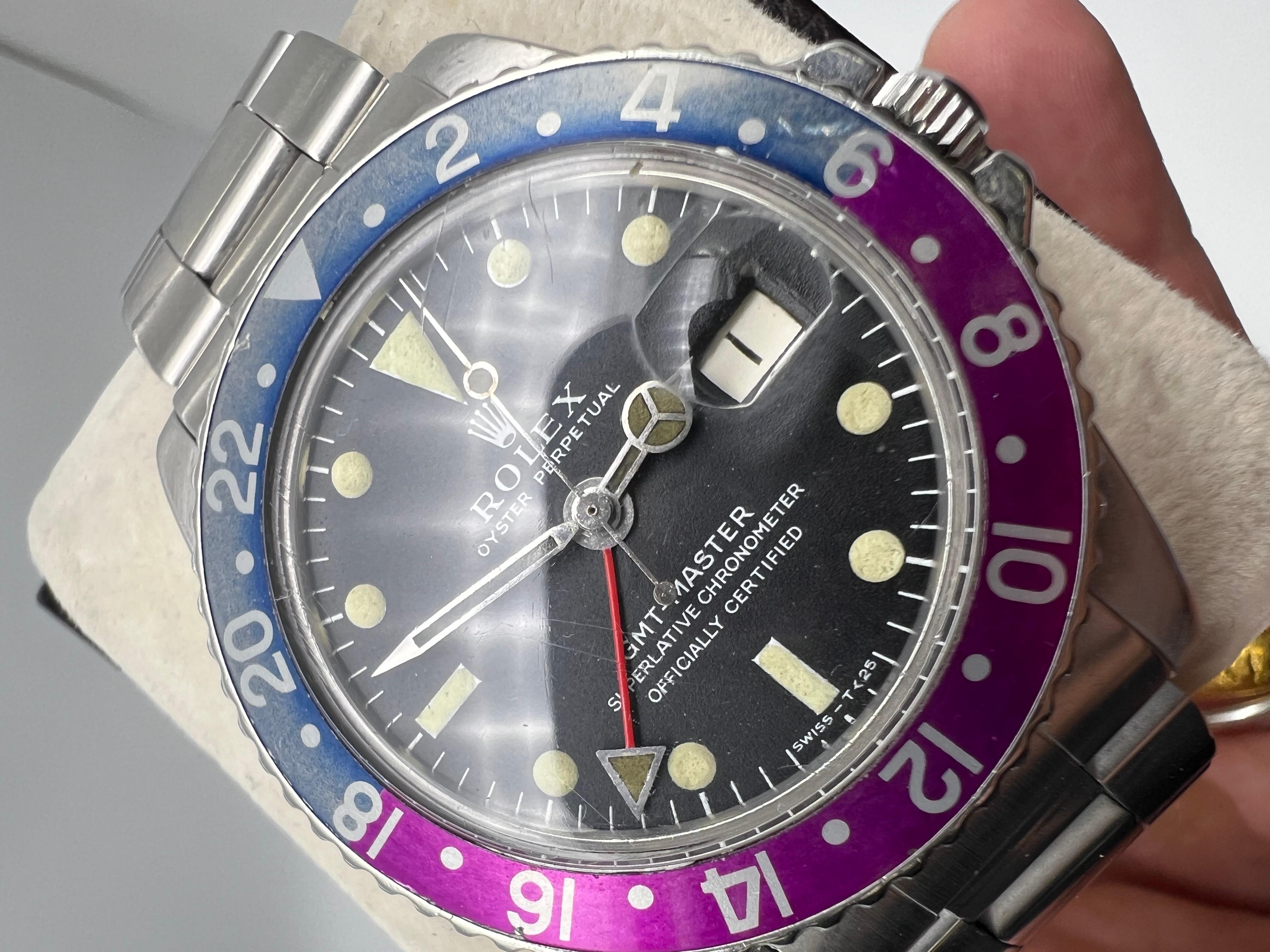  Rolex GMT MASTER 1675 Pepsi fuchsia lunette longue E en acier inoxydable 1968 Pour hommes 