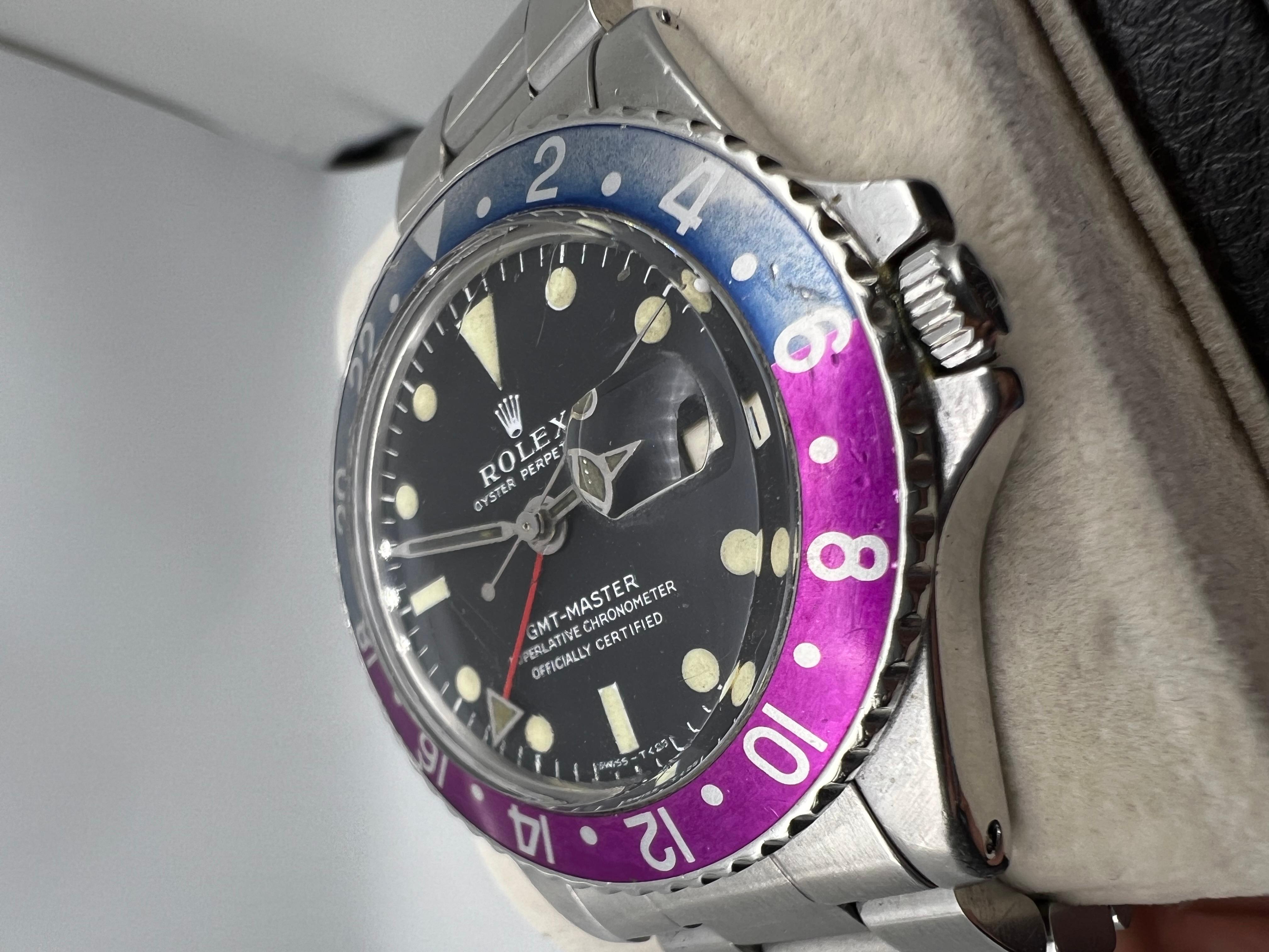 Rolex GMT MASTER 1675 Pepsi fuchsia lunette longue E en acier inoxydable 1968 1