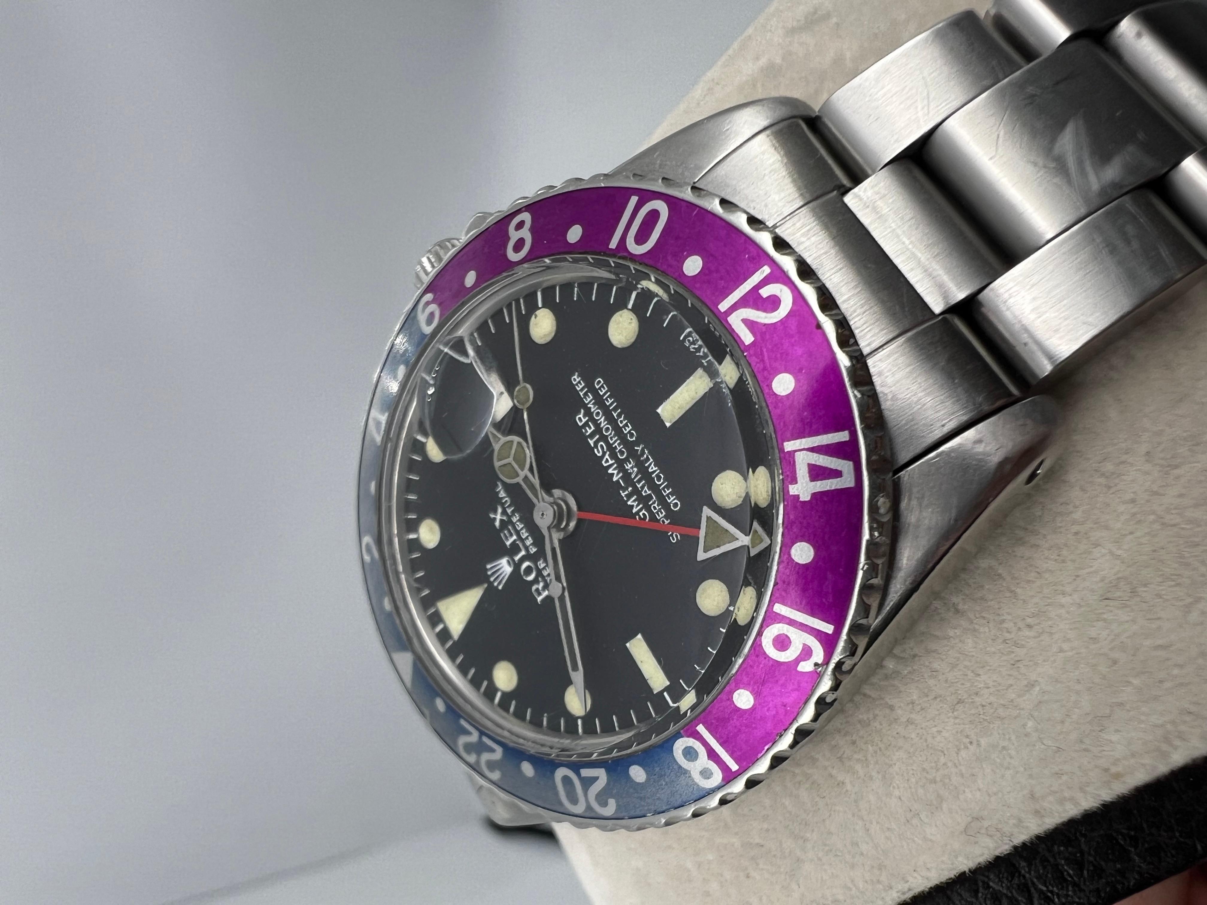 Rolex GMT MASTER 1675 Pepsi fuchsia lunette longue E en acier inoxydable 1968 4