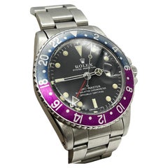 Rolex GMT MASTER 1675 Pepsi fuchsia lunette longue E en acier inoxydable 1968