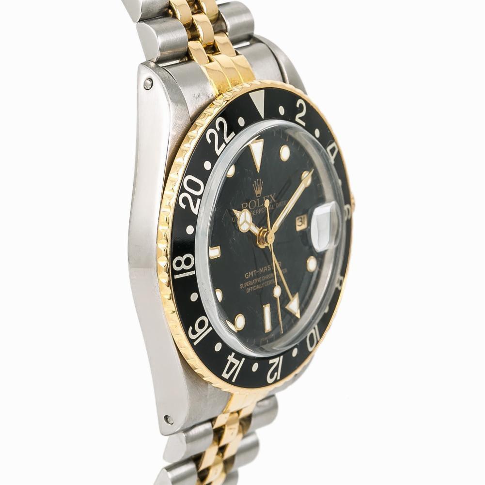 Rolex GMT Master Reference #:16753. Rolex GMT-Master 16753 Vintage Mens Automatic Watch Black Dial Two Tone 40mm. Verified and Certified by WatchFacts. 1 year warranty offered by WatchFacts.
