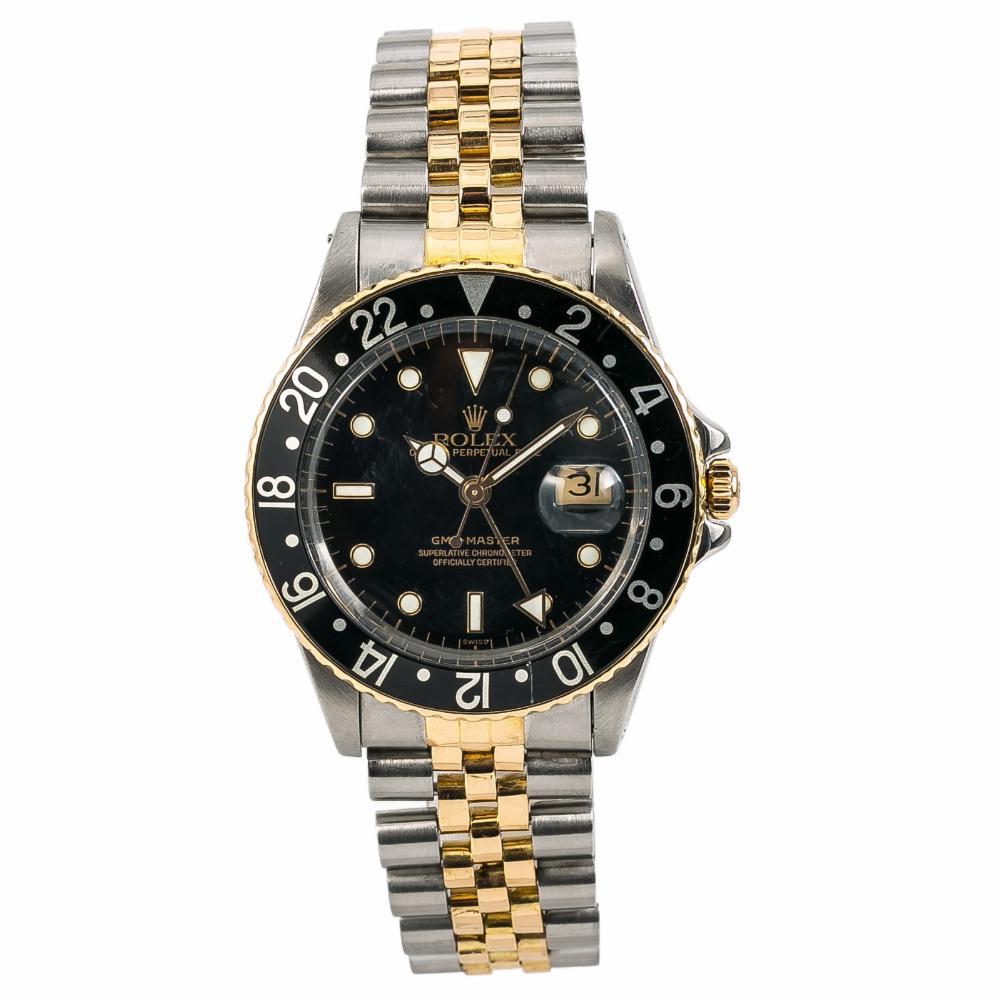 Rolex GMT Master Reference #:16753. Rolex GMT-Master 16753 Vintage Mens Automatic Watch Black Dial Two Tone 40mm. Verified and Certified by WatchFacts. 1 year warranty offered by WatchFacts.
