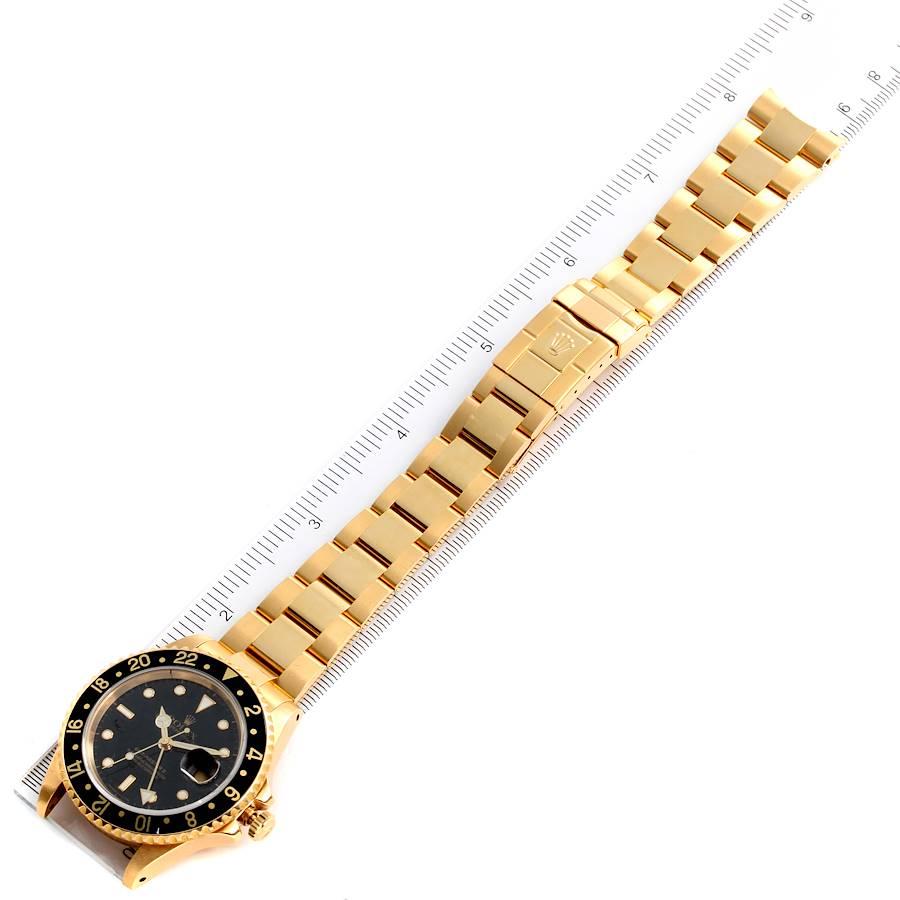 Rolex GMT Master 18K Gelbgold Schwarzes Zifferblatt Herrenuhr 16718 Box Service Karte im Angebot 7